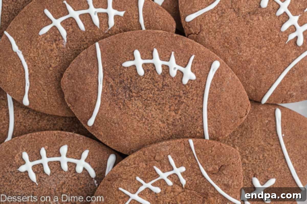 Championship Chocolate Football Cookies 2 Football cookies arranged in a delightful pile, ready for game day celebrations.