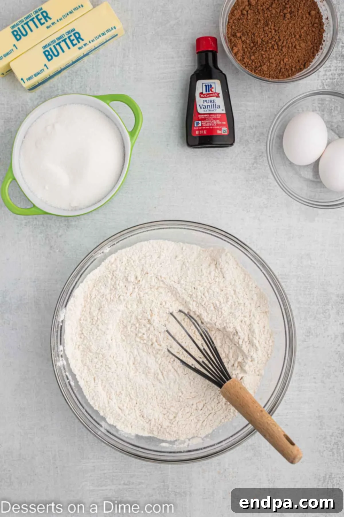 Championship Chocolate Football Cookies 4 Dry ingredients for cookies in a large mixing bowl, ready to be whisked together.