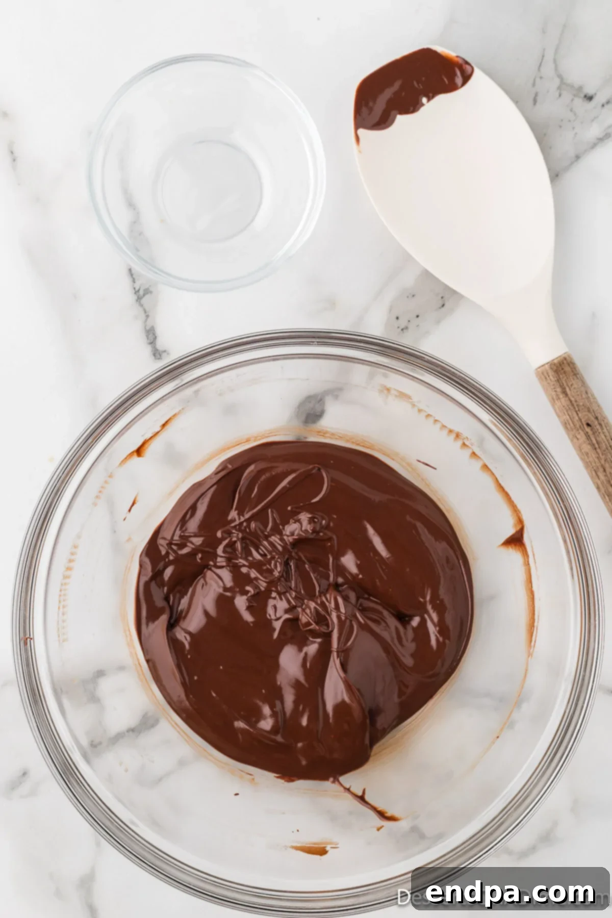 Velvety Chocolate Bliss 5 Perfectly melted chocolate, smooth and glossy, ready for the next step in making chocolate mousse.