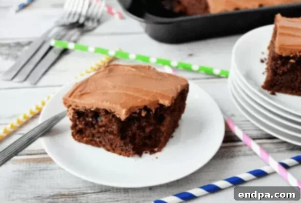 Love Baked Delights 4 Slice of Chocolate Coca-Cola Cake with frosting.