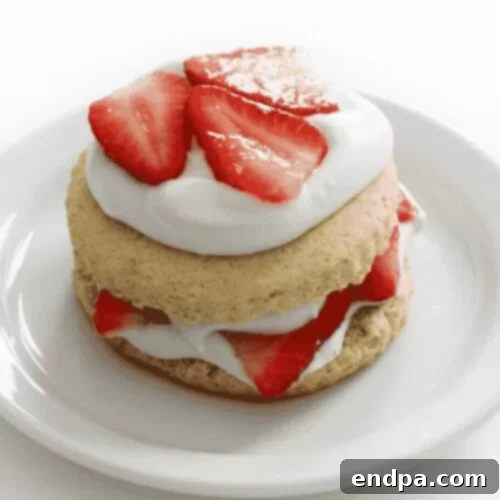 Love Baked Delights 14 Gluten-Free Strawberry Shortcake with fresh strawberries and cream.