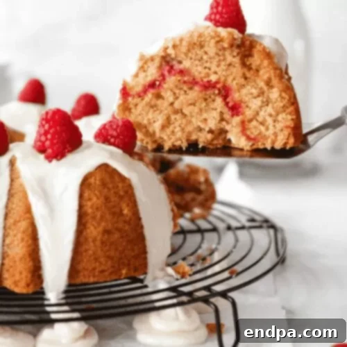 Love Baked Delights 16 Raspberry White Chocolate Bundt Cake slice.