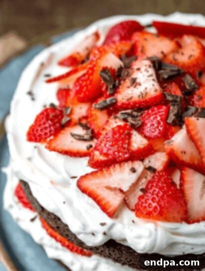 Love Baked Delights 18 Strawberries and Cream Chocolate Cake with fresh strawberries.