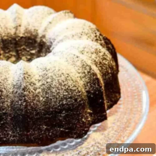 Love Baked Delights 24 Red Wine Chocolate Cake with ganache and berries.