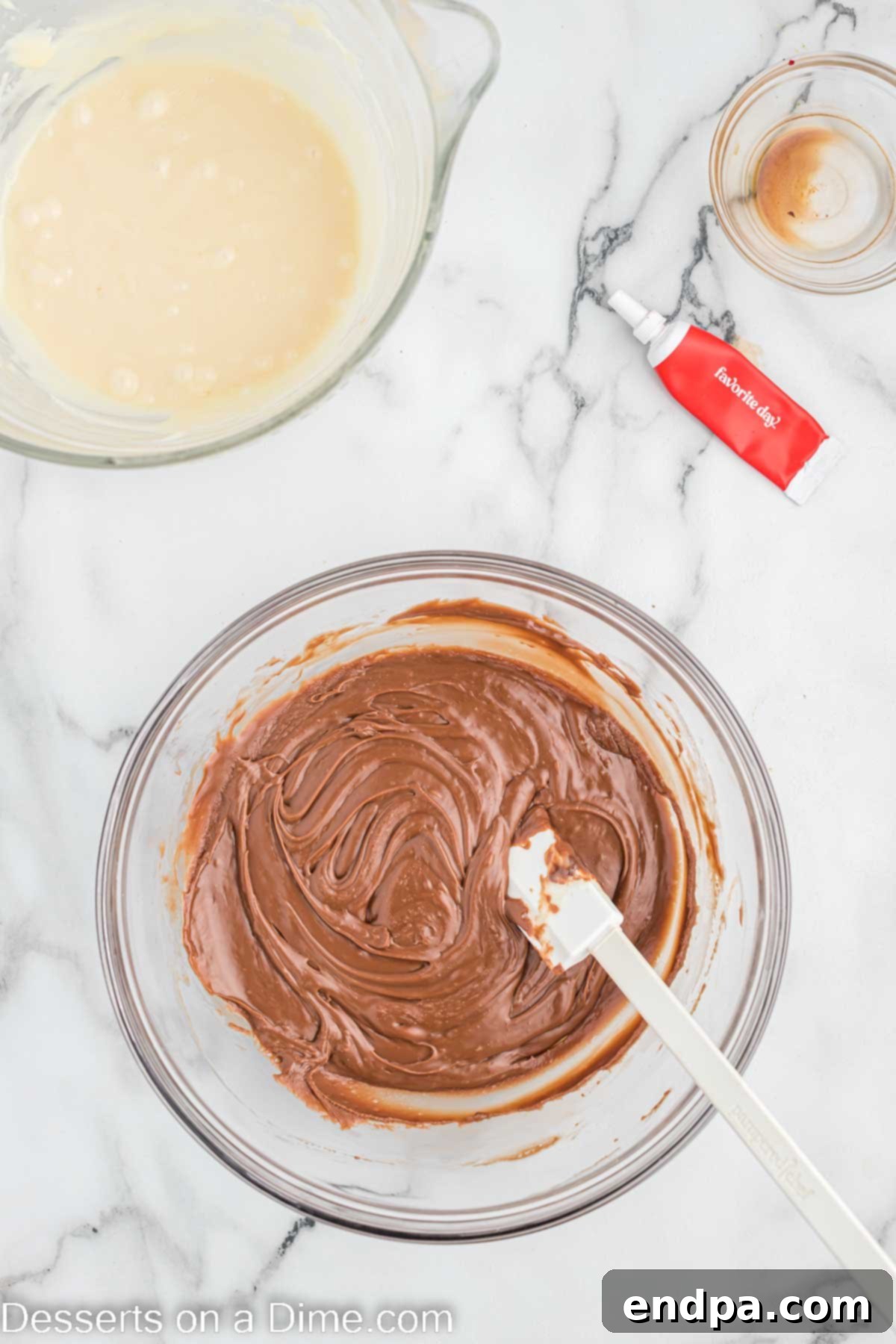 Close-up of a bowl with perfectly melted chocolate, smooth and ready for the next step.
