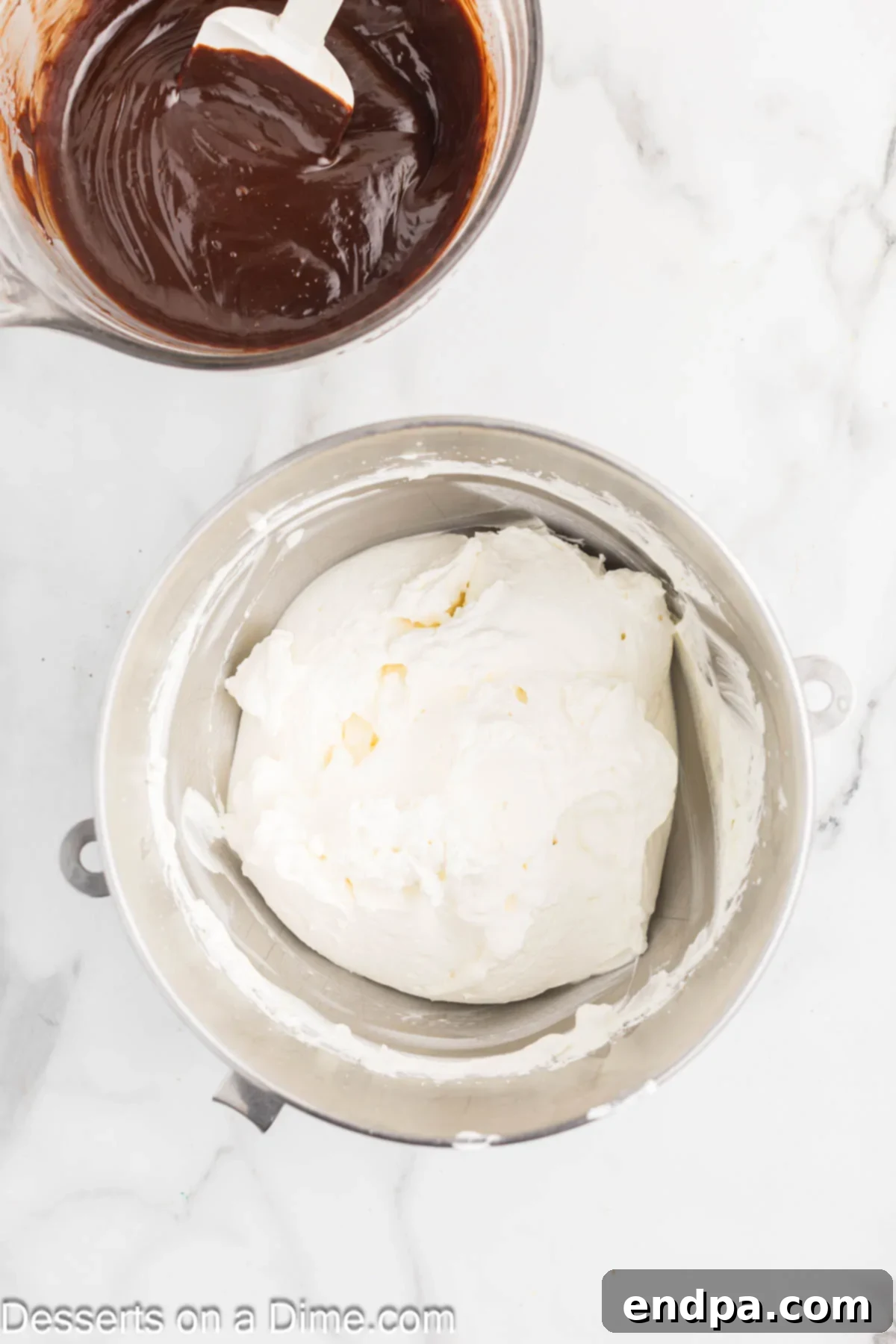 Decadent Chocolate Mousse Delight 5 Heavy whipping cream beaten until stiff peaks form in a bowl.