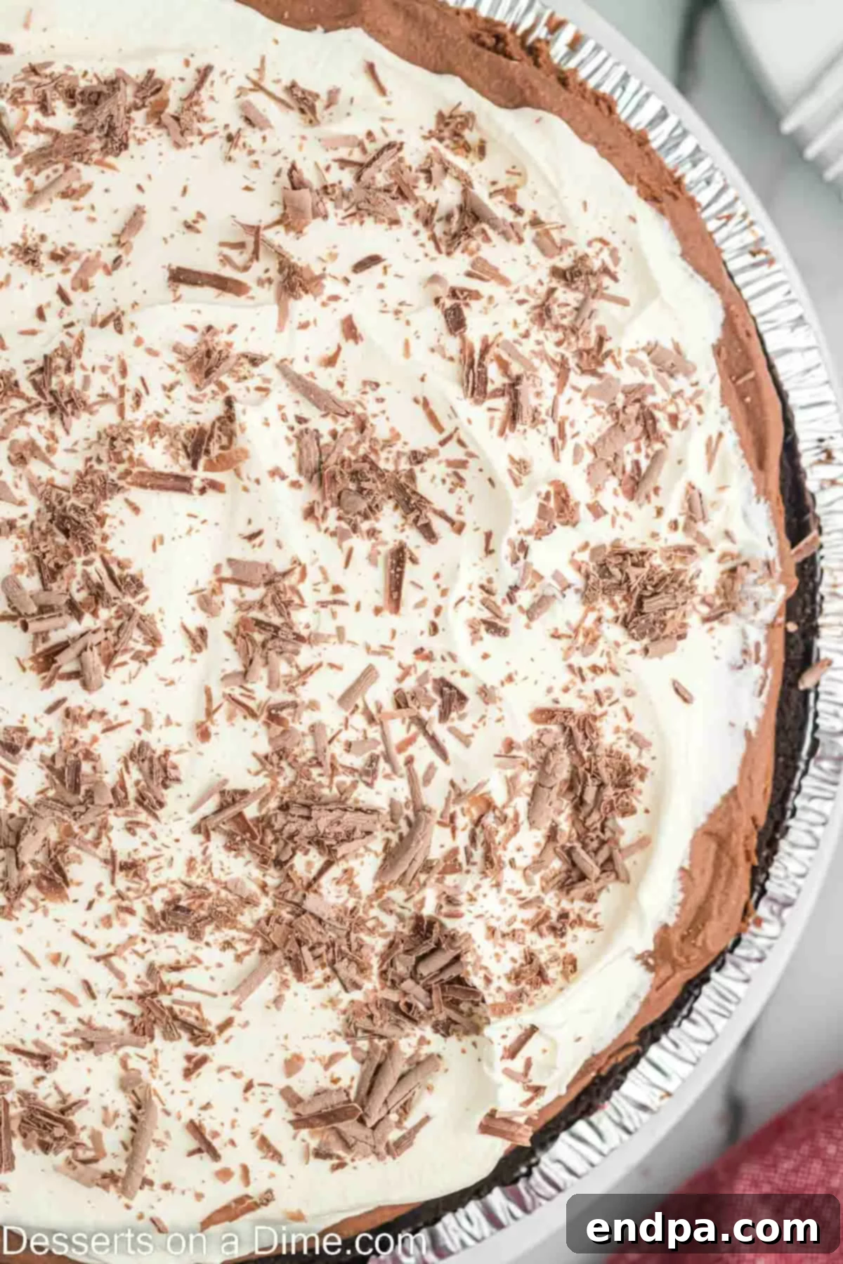 Decadent Chocolate Mousse Delight 8 A beautifully presented chocolate mousse pie, ready to be enjoyed.