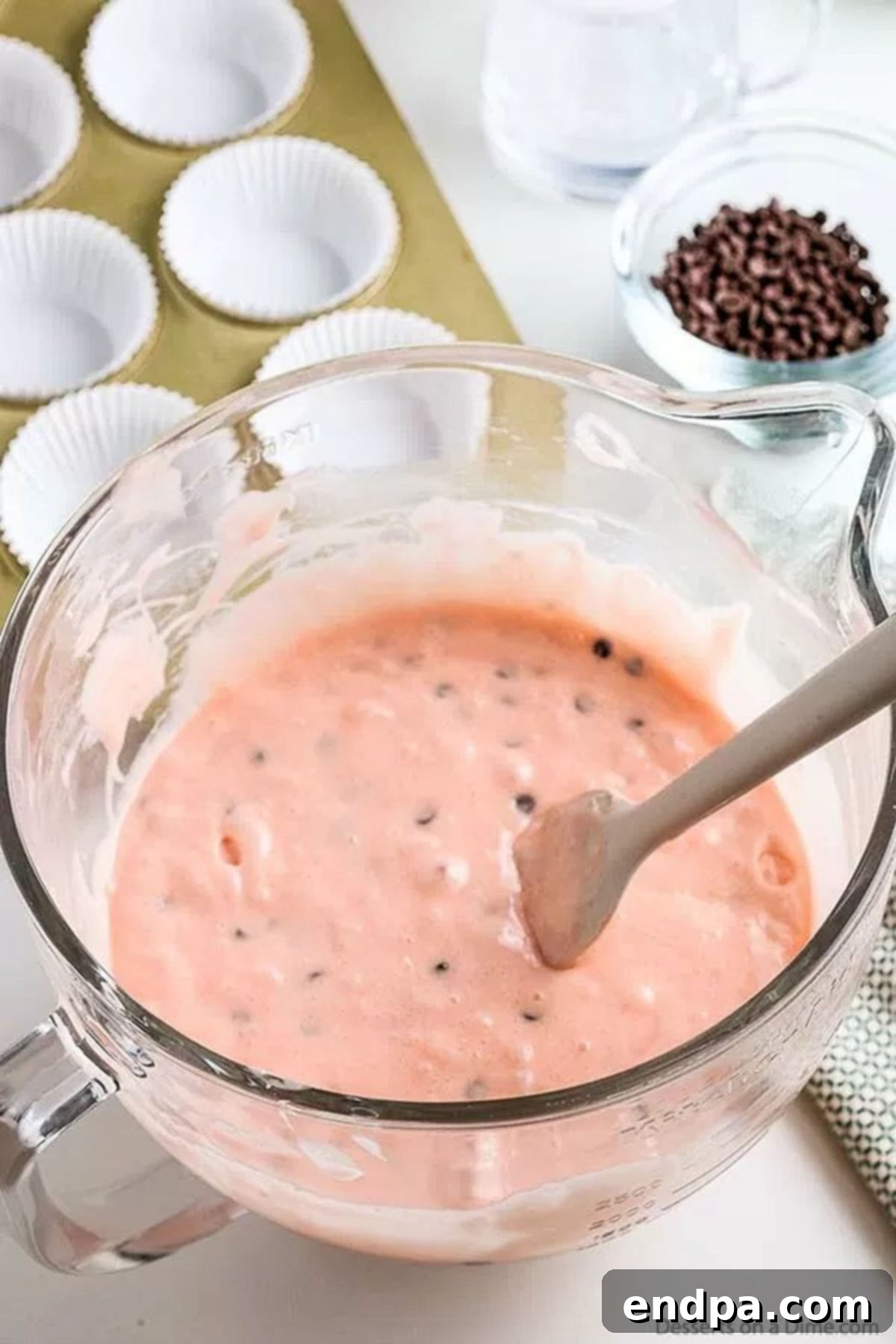Watermelon Splash Cupcakes 4 Cupcake batter fully combined in a bowl, ready for baking.