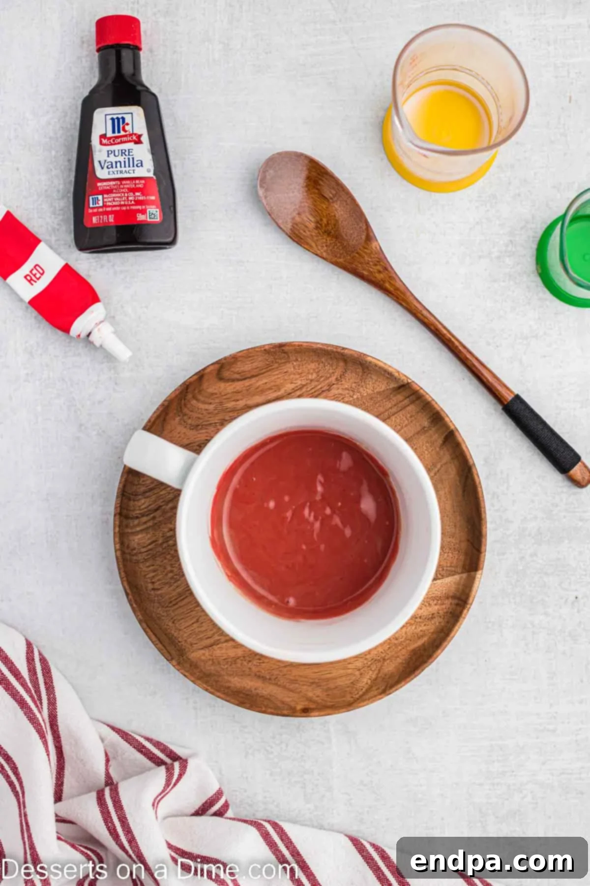 Red food coloring added to the mug cake mixture and combined until a deep red color