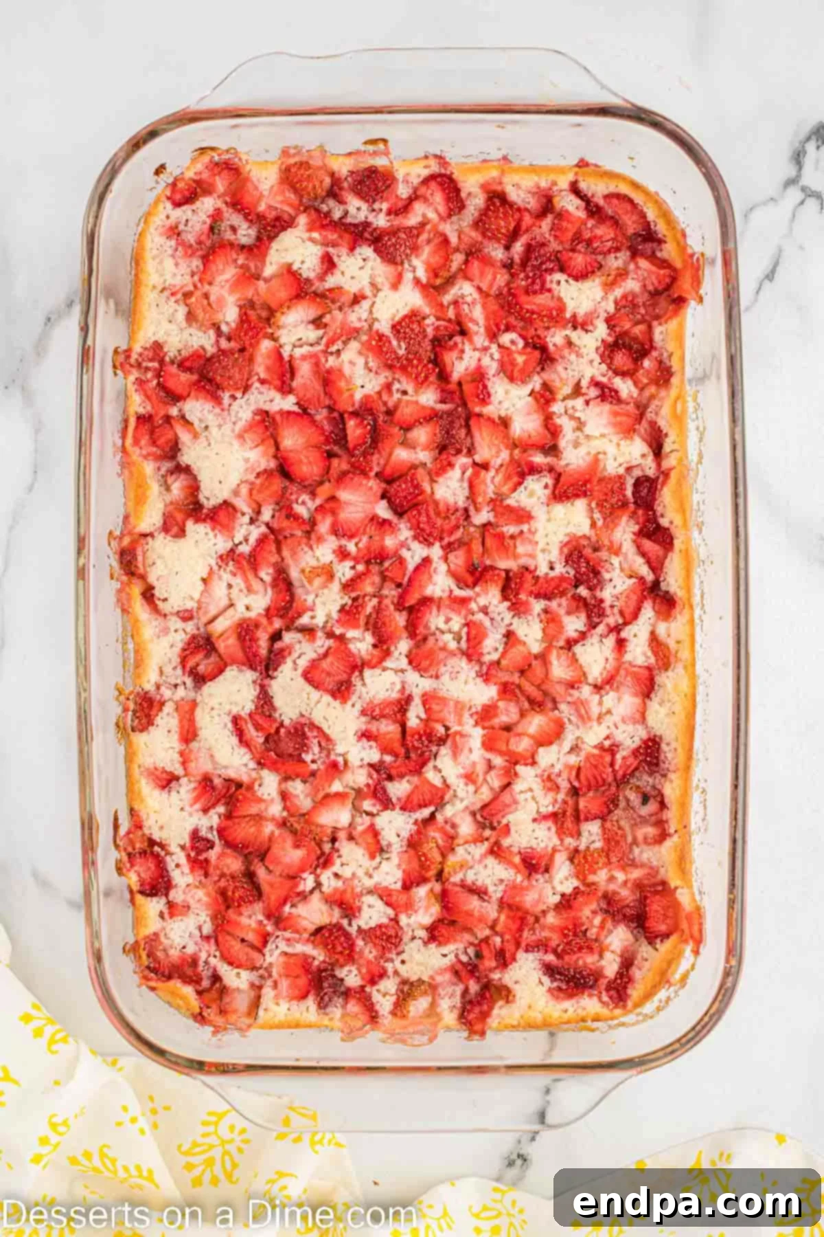 Strawberry cobbler in baking dish. 