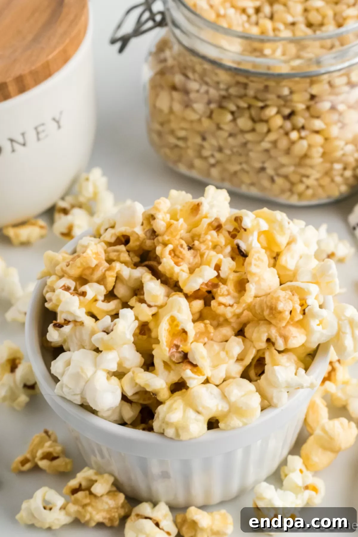 Honey Butter Popcorn in a bowl, a perfect sweet and salty snack for any occasion.