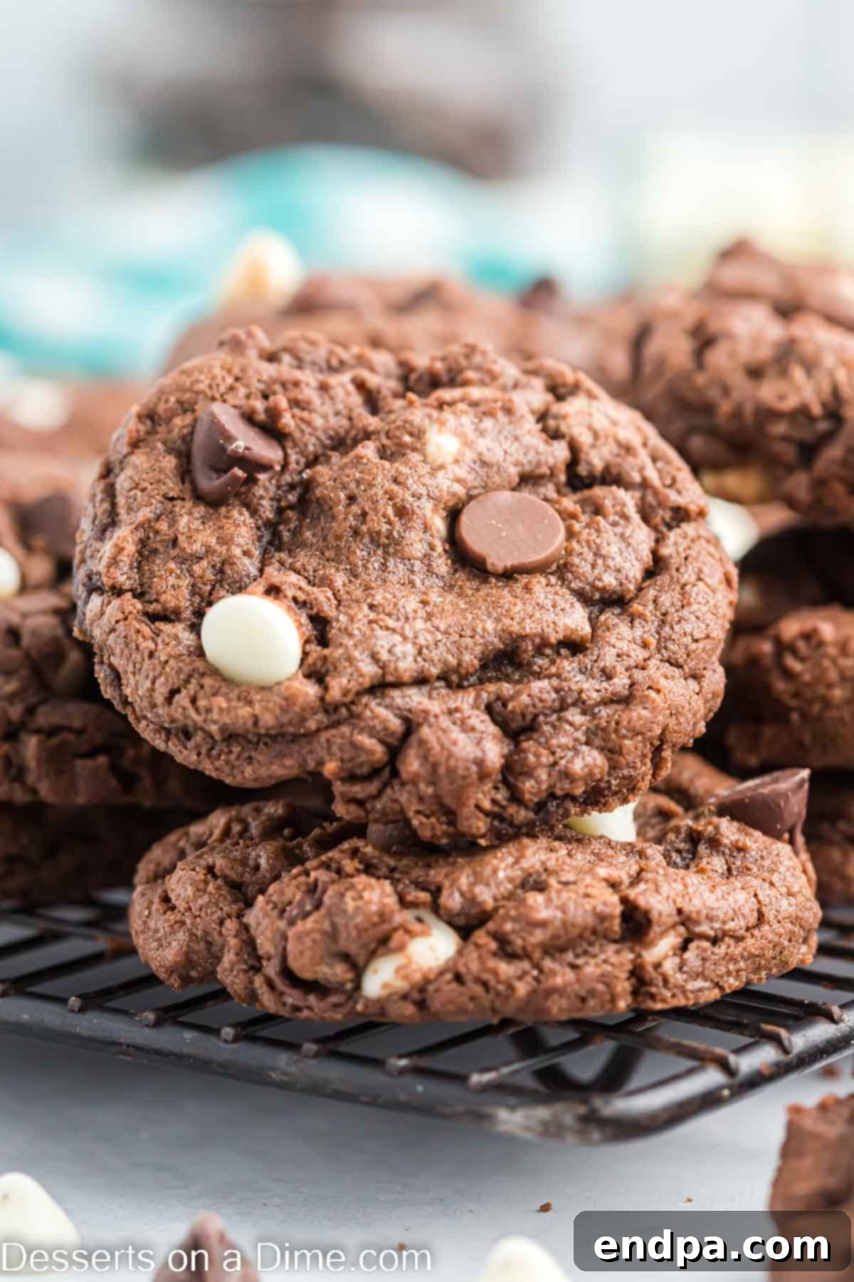Triple chocolate cookies stacked together, showcasing their rich chocolate chips.