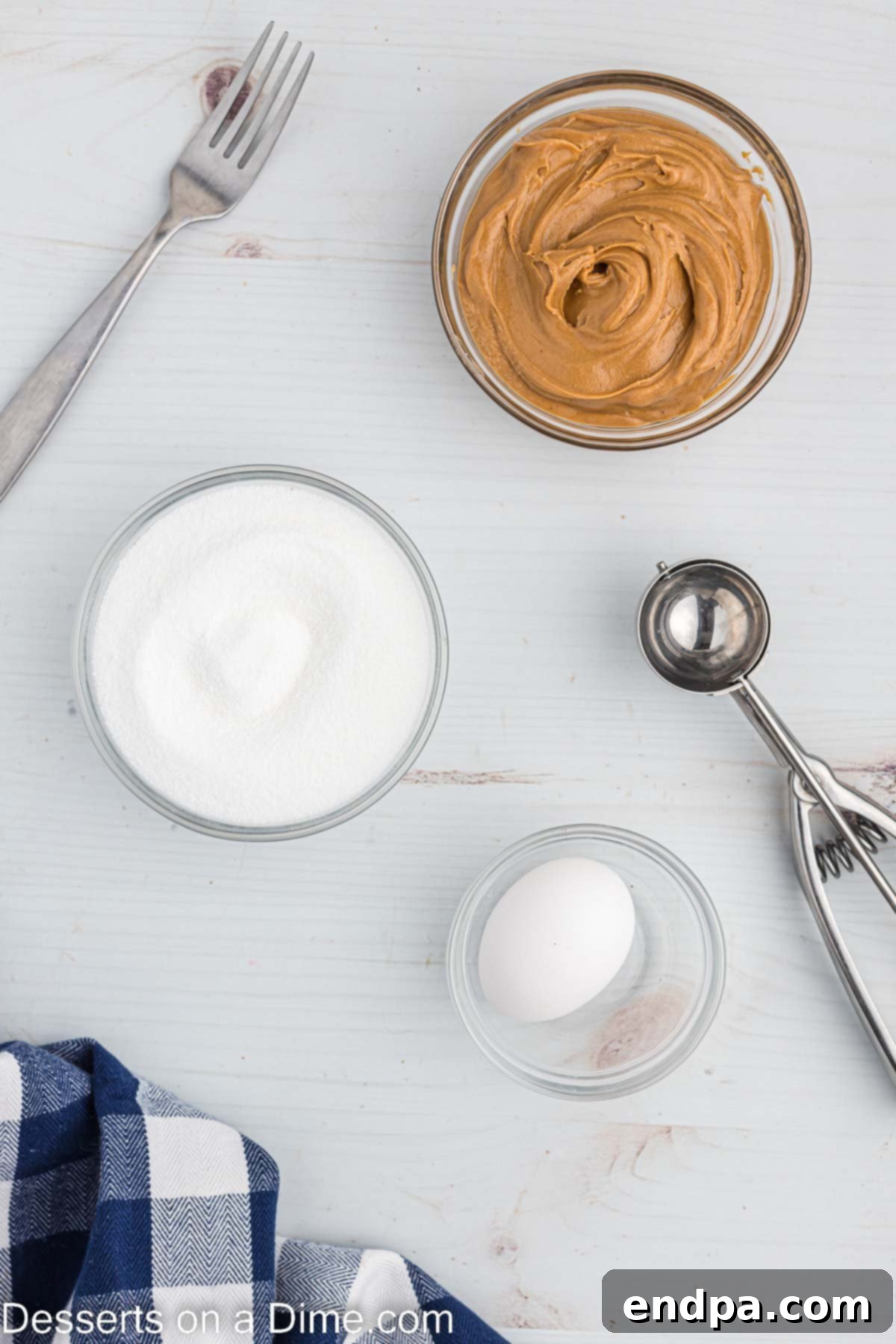 Ingredients for Air Fryer Peanut Butter cookies - peanut butter, egg, sugar. 