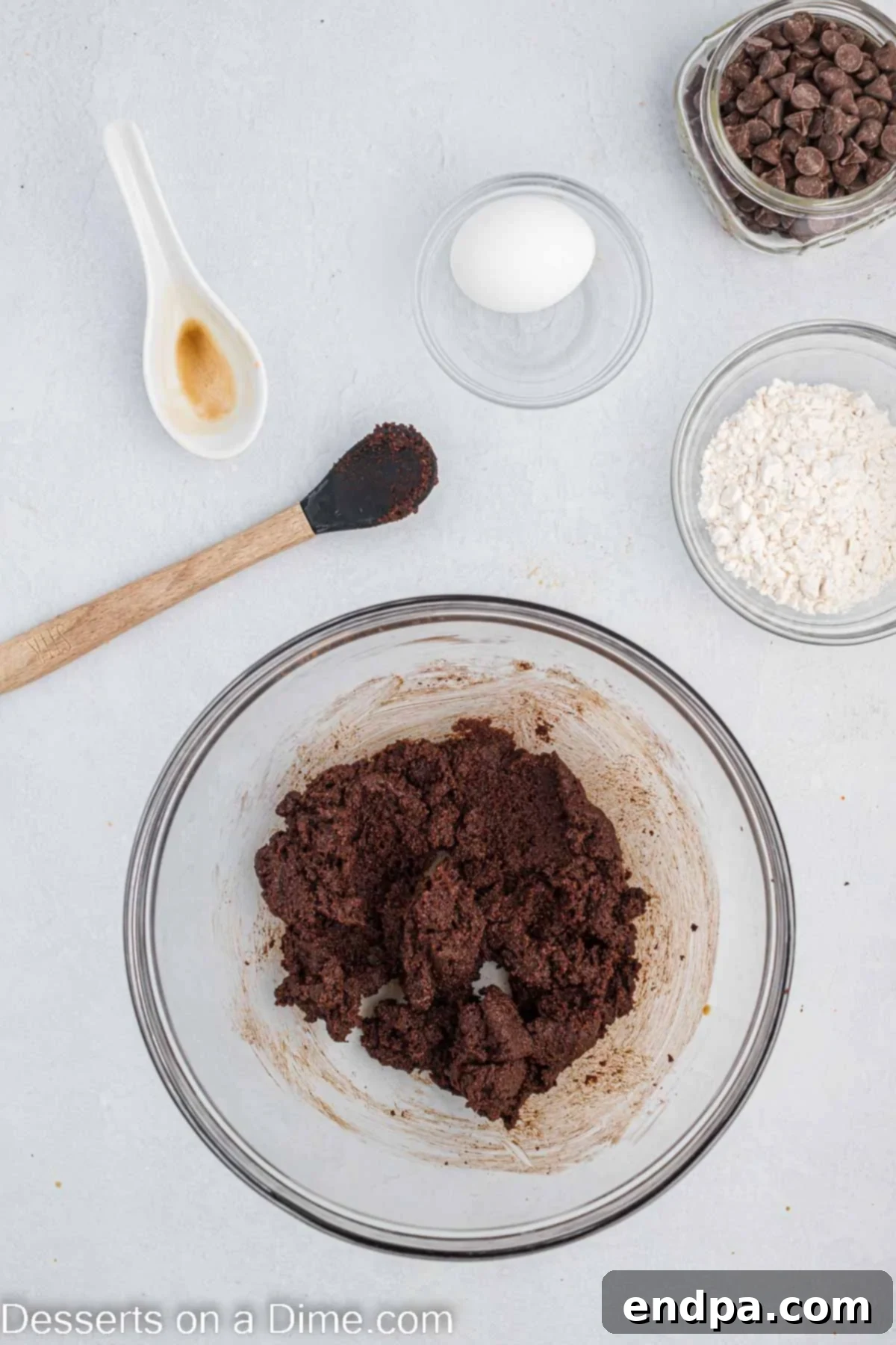 Bowl of butter, brown sugar and cocoa powder combined.