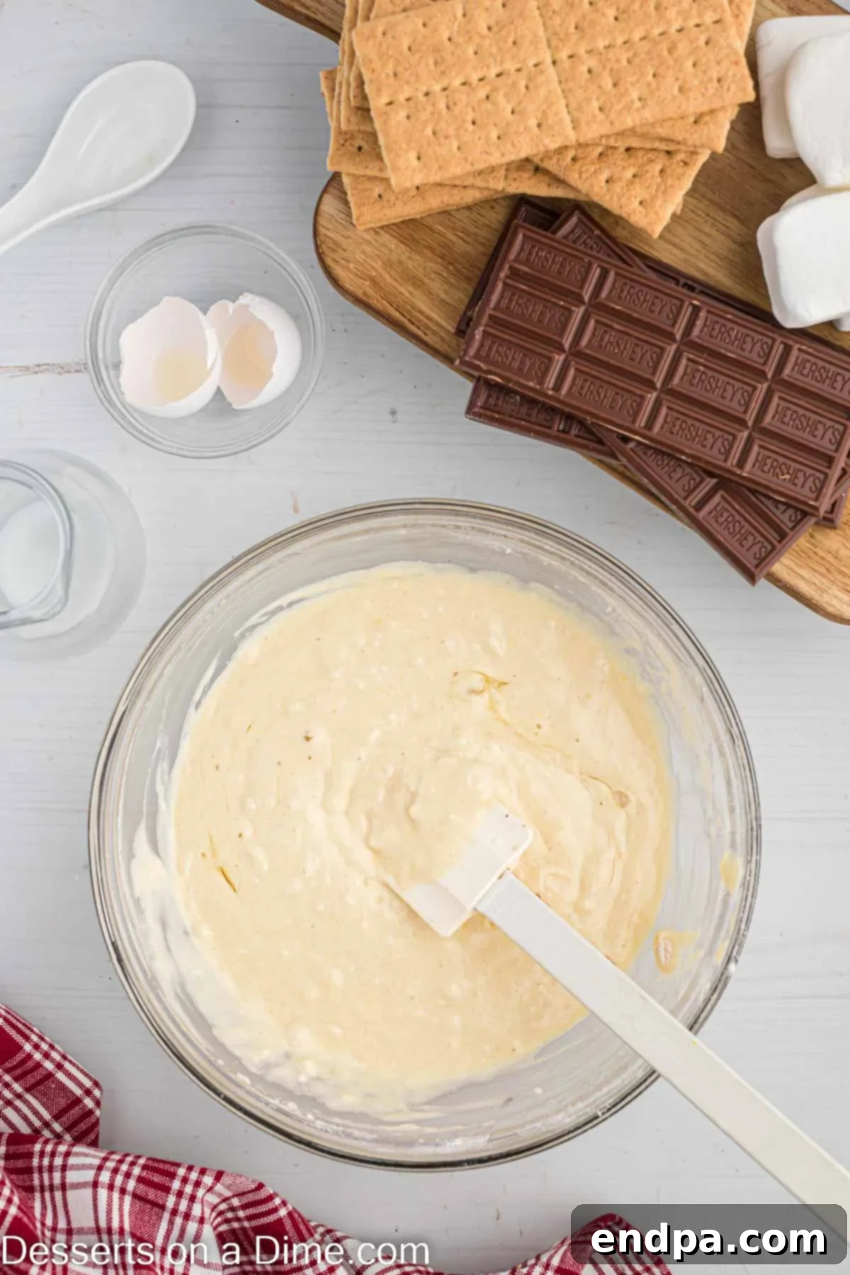 Crispy Golden Smores Delight 4 Pancake batter mixed in a bowl, showing a smooth, lump-free consistency.