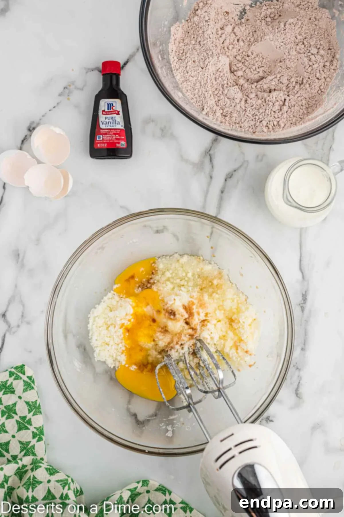 Creamed butter and sugar in a mixing bowl, showcasing a light and fluffy texture.