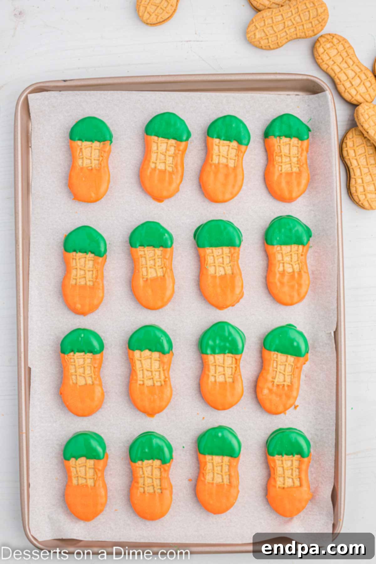Lucky Leprechaun Bites 7 Finished green-dipped hats on leprechaun cookies, cooling on a baking sheet.