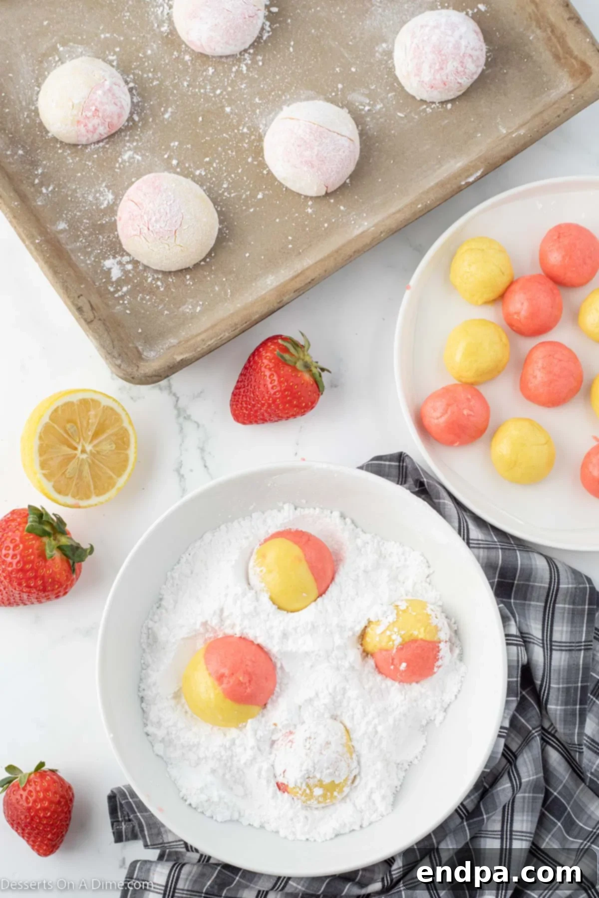 Tangy Strawberry Lemonade Cookies 6 Lemon and strawberry cookie dough balls rolled together and then tossed in powdered sugar.