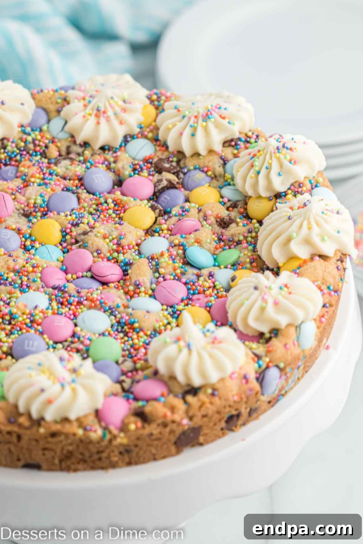 Easter Cookie Cake decorated with pastel colors on a cake stand, close-up shot of its festive details