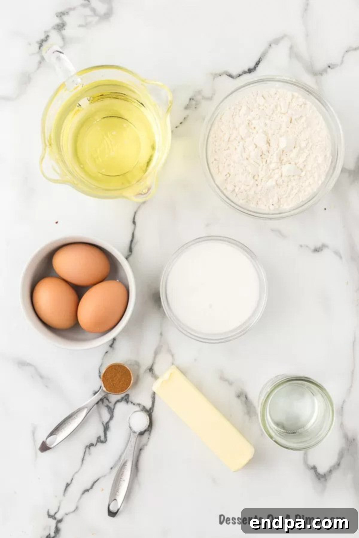 Springtime Krispie Delights 3 Ingredients for Easter Rice Krispie Treats including rice krispie cereal, butter, mini marshmallows, pastel M&M's, and pastel sprinkles.