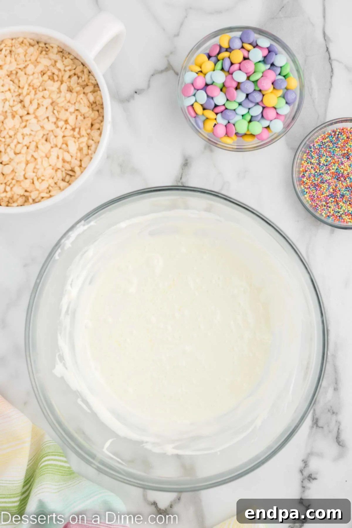 Springtime Krispie Delights 4 Bowl with melted marshmallows and butter mixture.