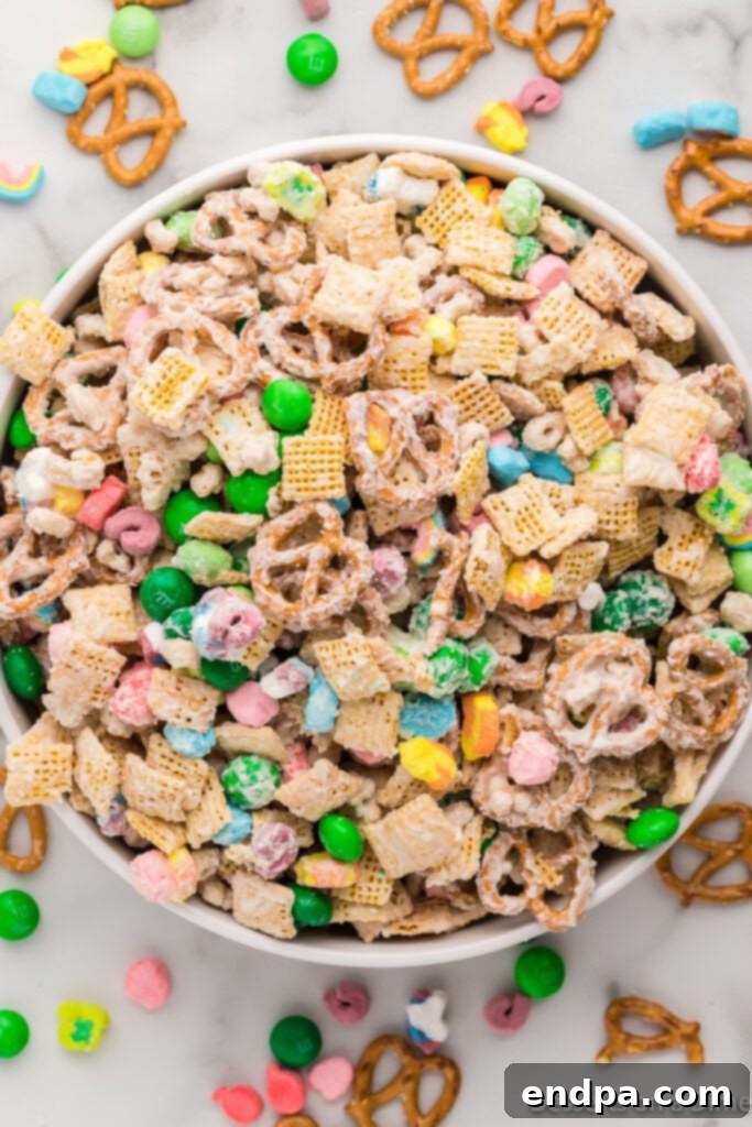 The Leprechaun's Lure 2 A bowl overflowing with festive Leprechaun Bait, showcasing its vibrant mix of cereals, pretzels, and candies.
