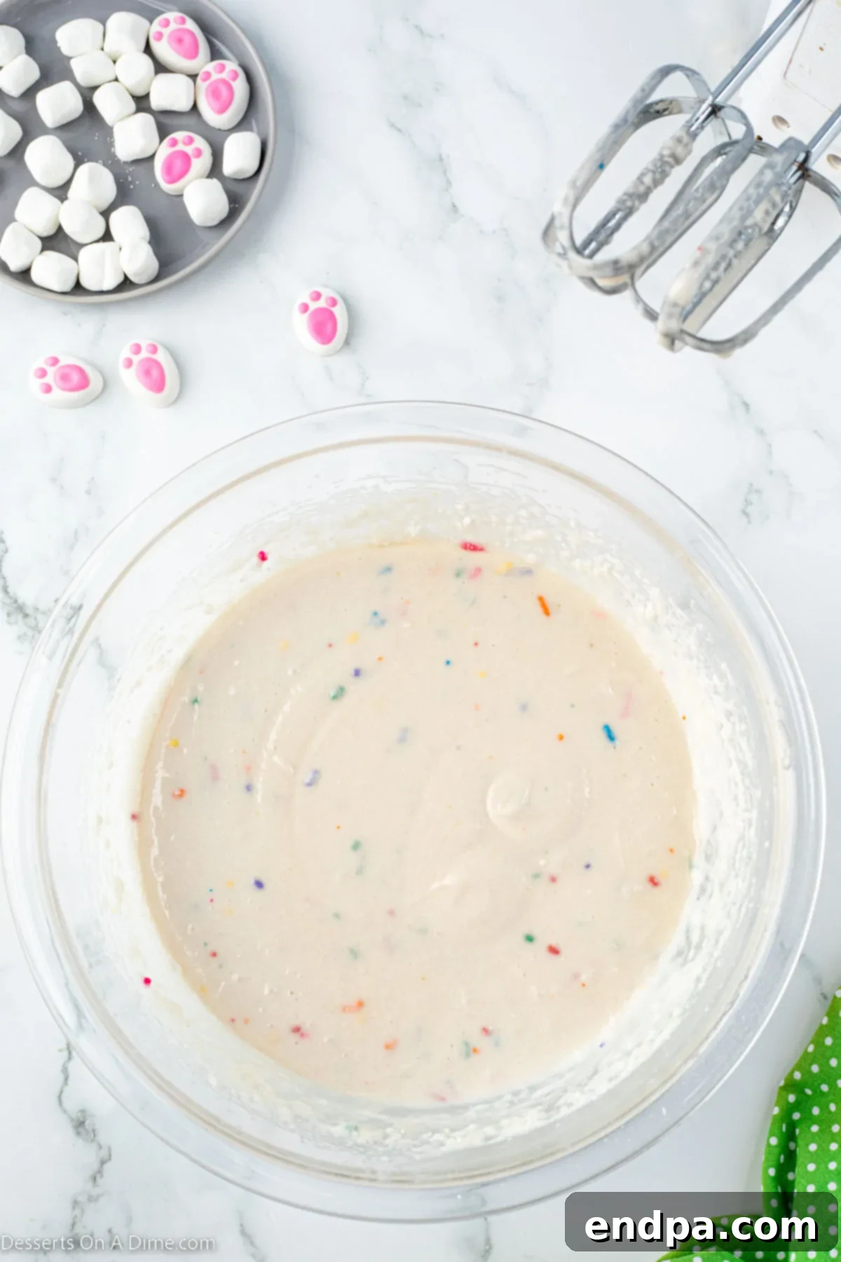 Smooth, combined cupcake batter ready for baking.