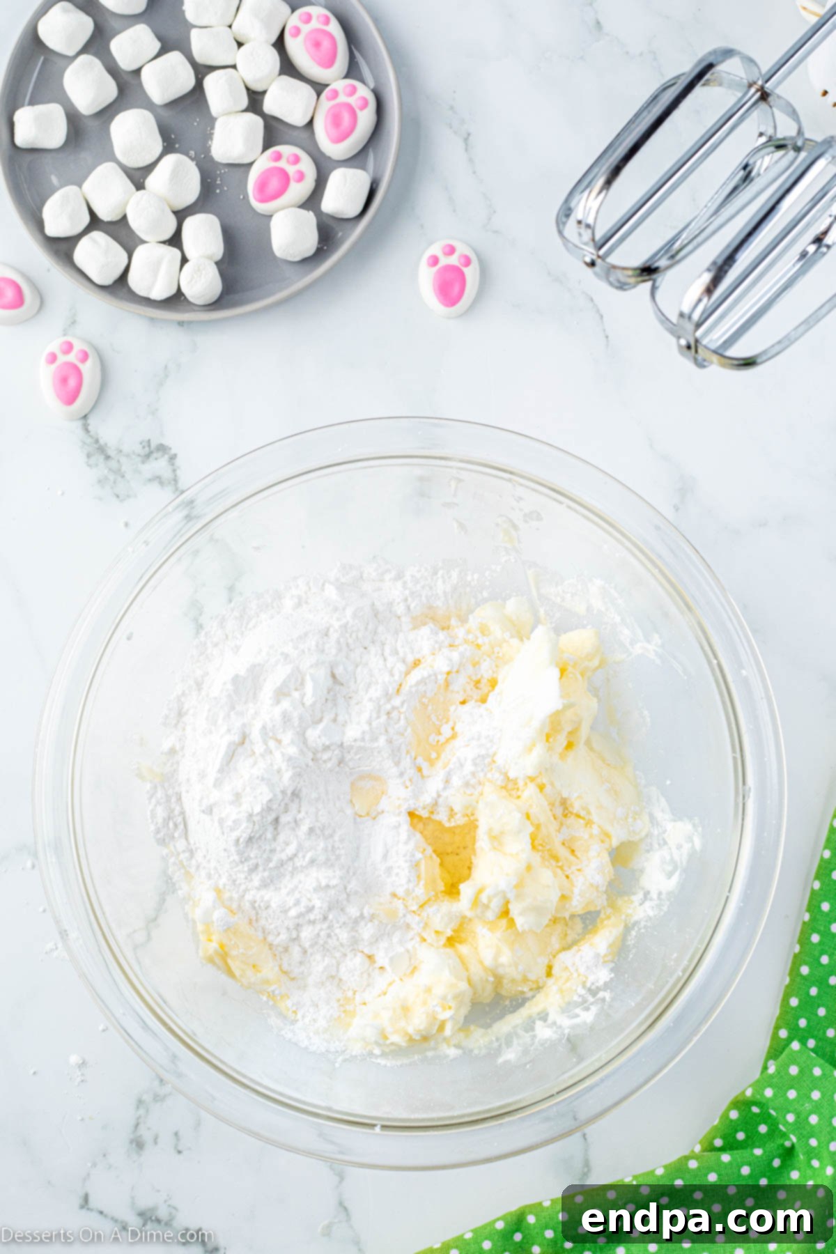 Softened shortening and butter in a mixing bowl, ready for making buttercream.