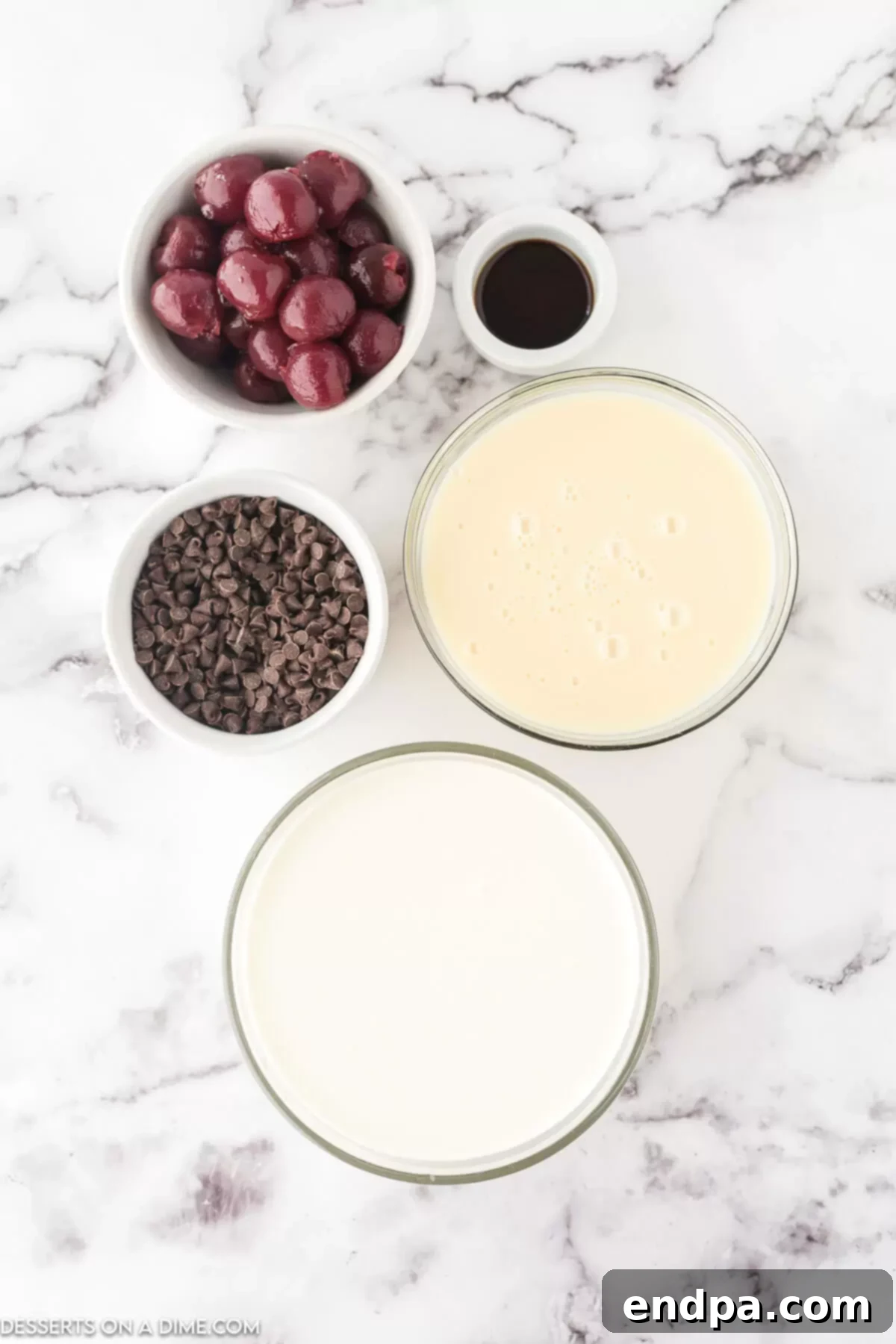 Dark Cherry Chocolate Dream Ice Cream 3 Ingredients for Cherry chocolate chip ice cream - heavy whipped cream, red cherries, sweetened condensed milk, mini chocolate chips on a white surface.