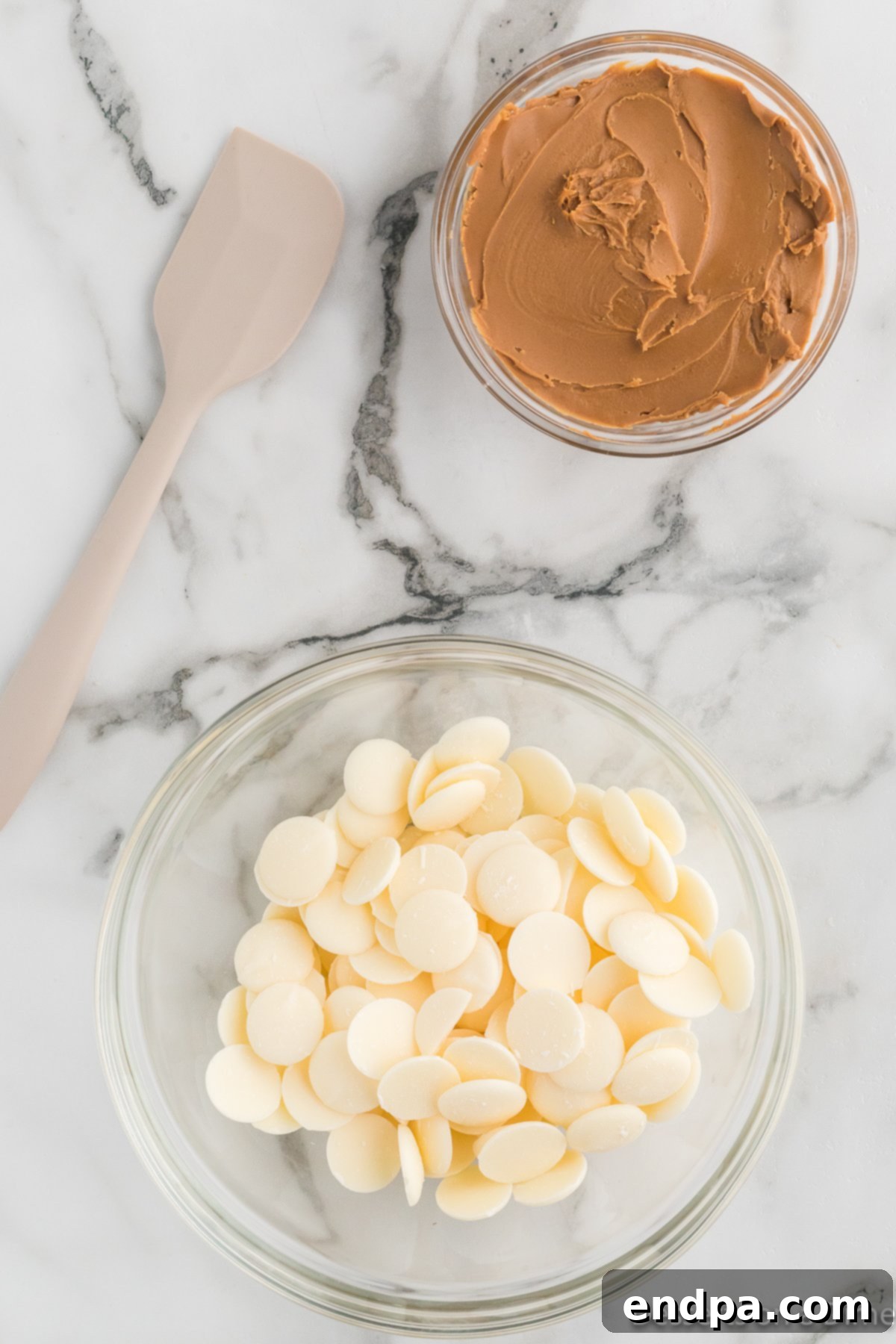 White melting chocolate in a bowl, ready to be melted.