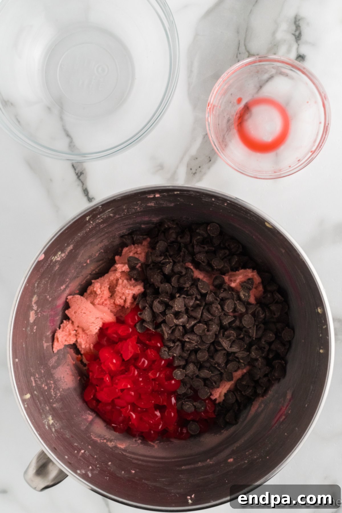 Cherries and chocolate folded into cookie dough. 