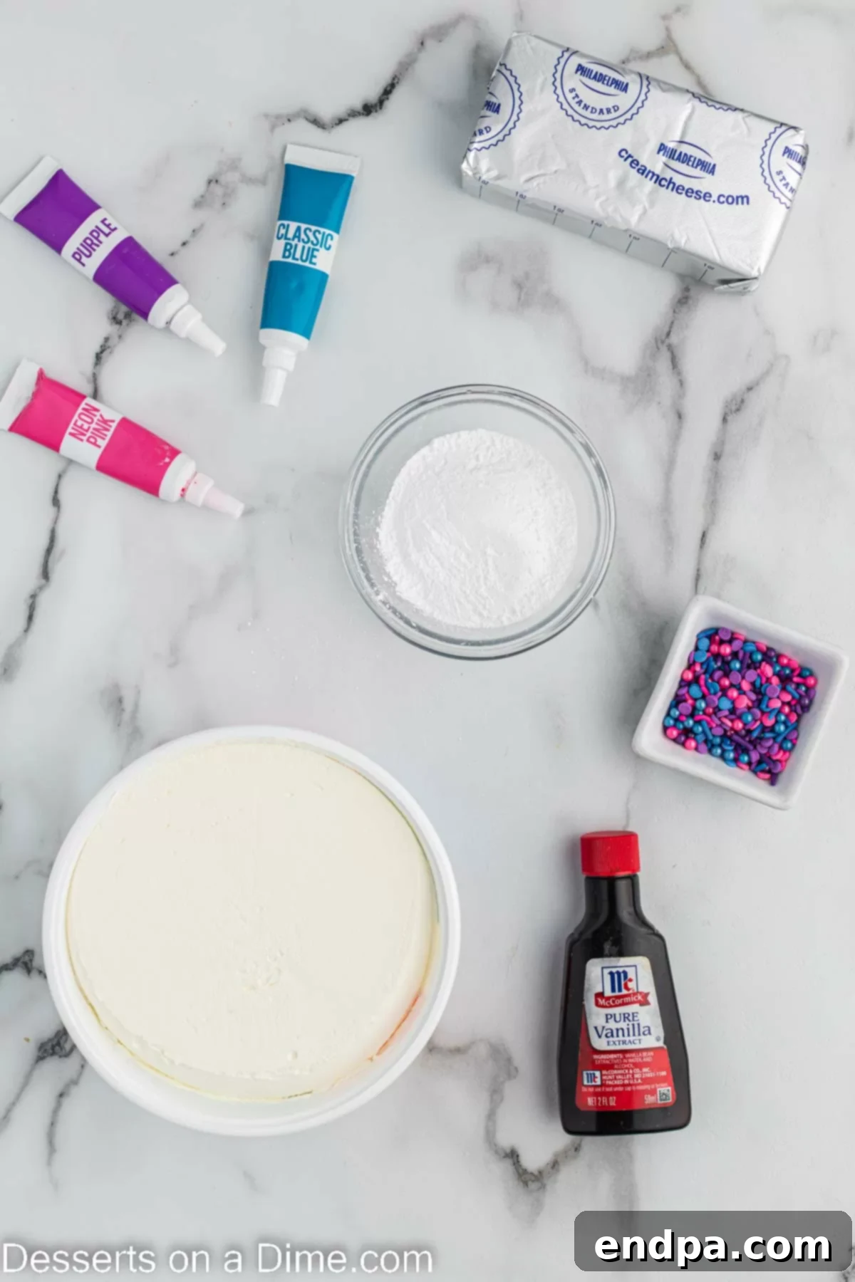 Ingredients for Unicorn dip - cream cheese, powdered sugar, vanilla, whipped topping, pink, purple and blue food coloring, sprinkles. 