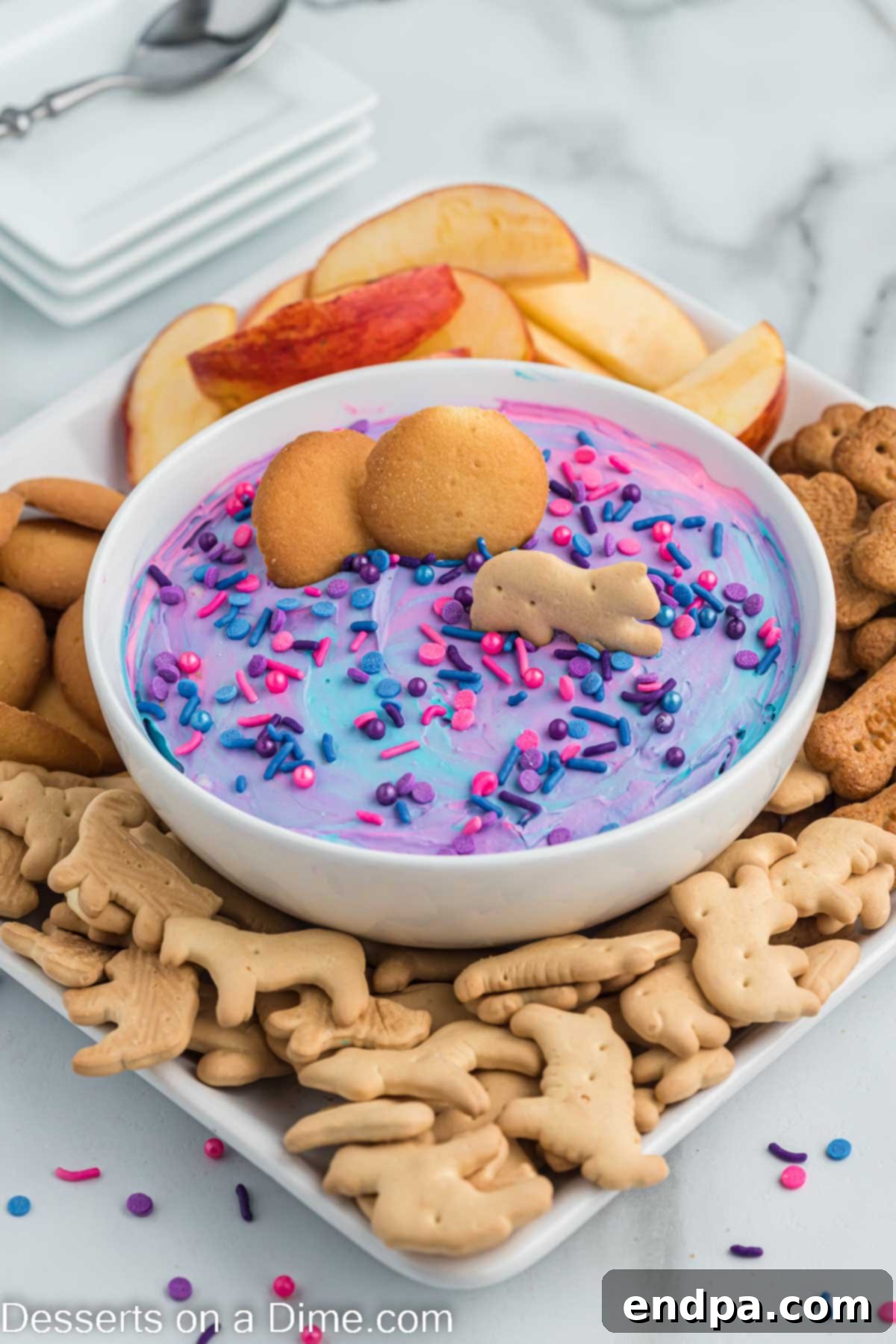 Unicorn dip in a bowl with dippers. 