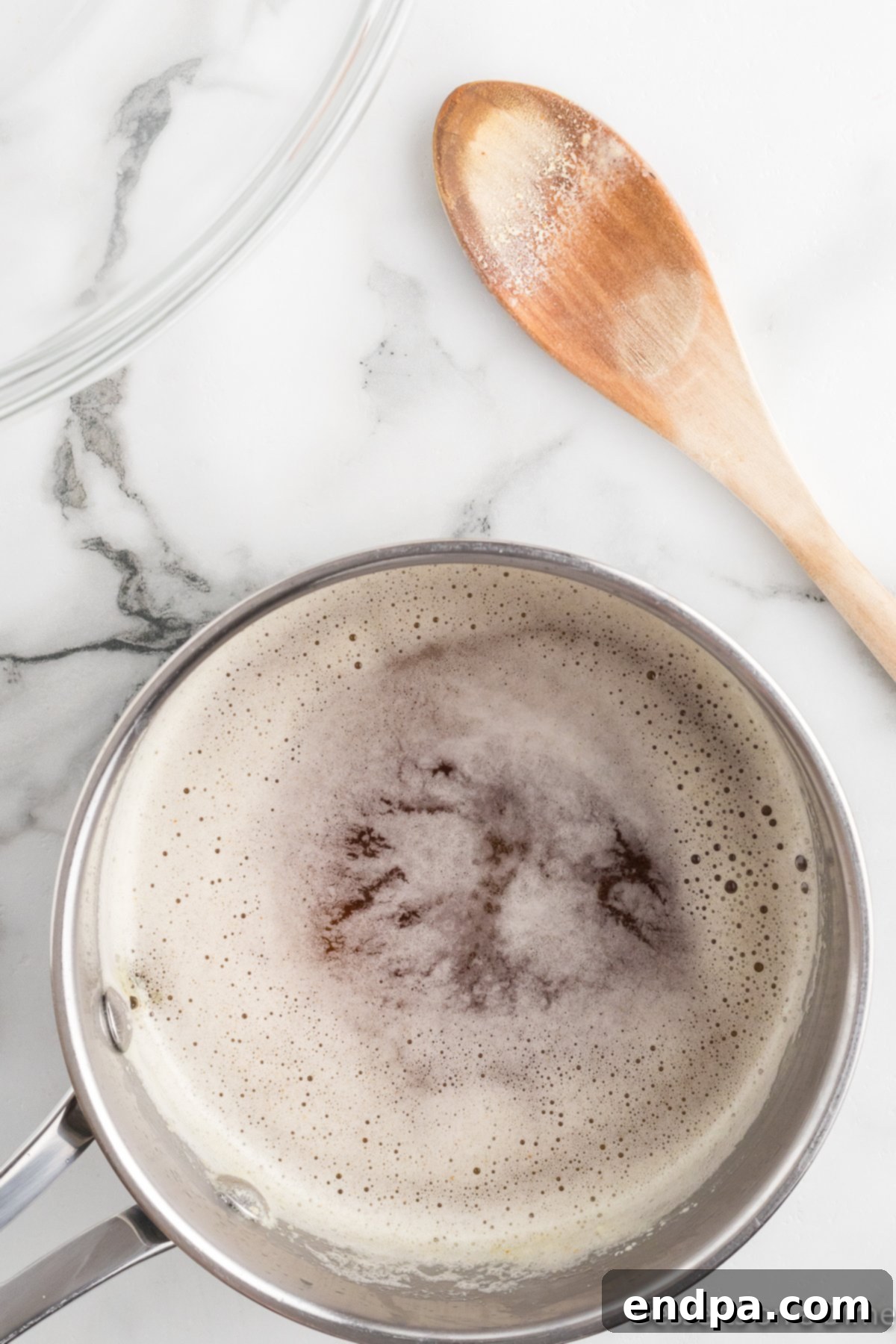 Ultimate Nutella Bomb Cookies 4 Melted butter in saucepan.