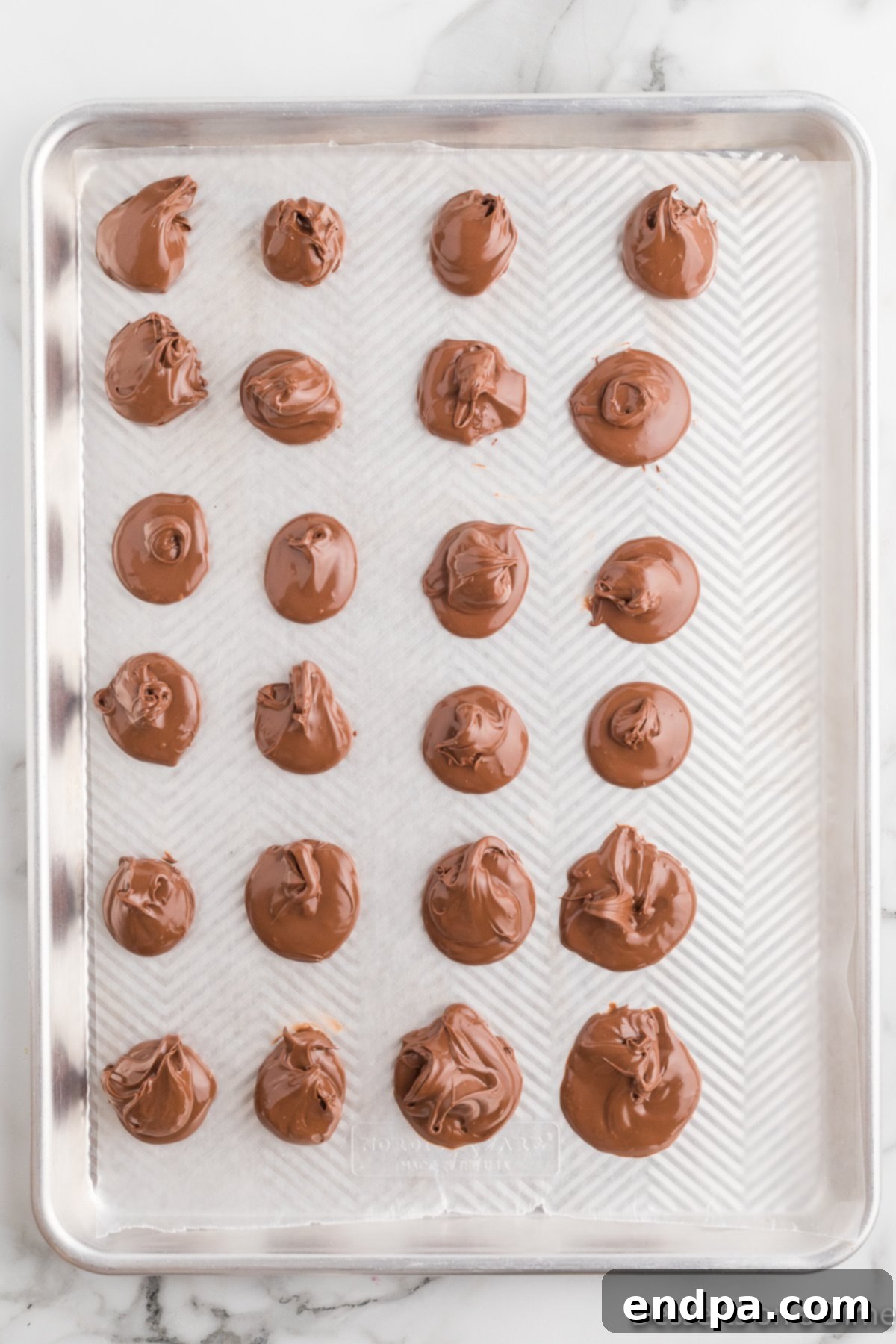 Ultimate Nutella Bomb Cookies 5 Drops of nutella ready to freeze.