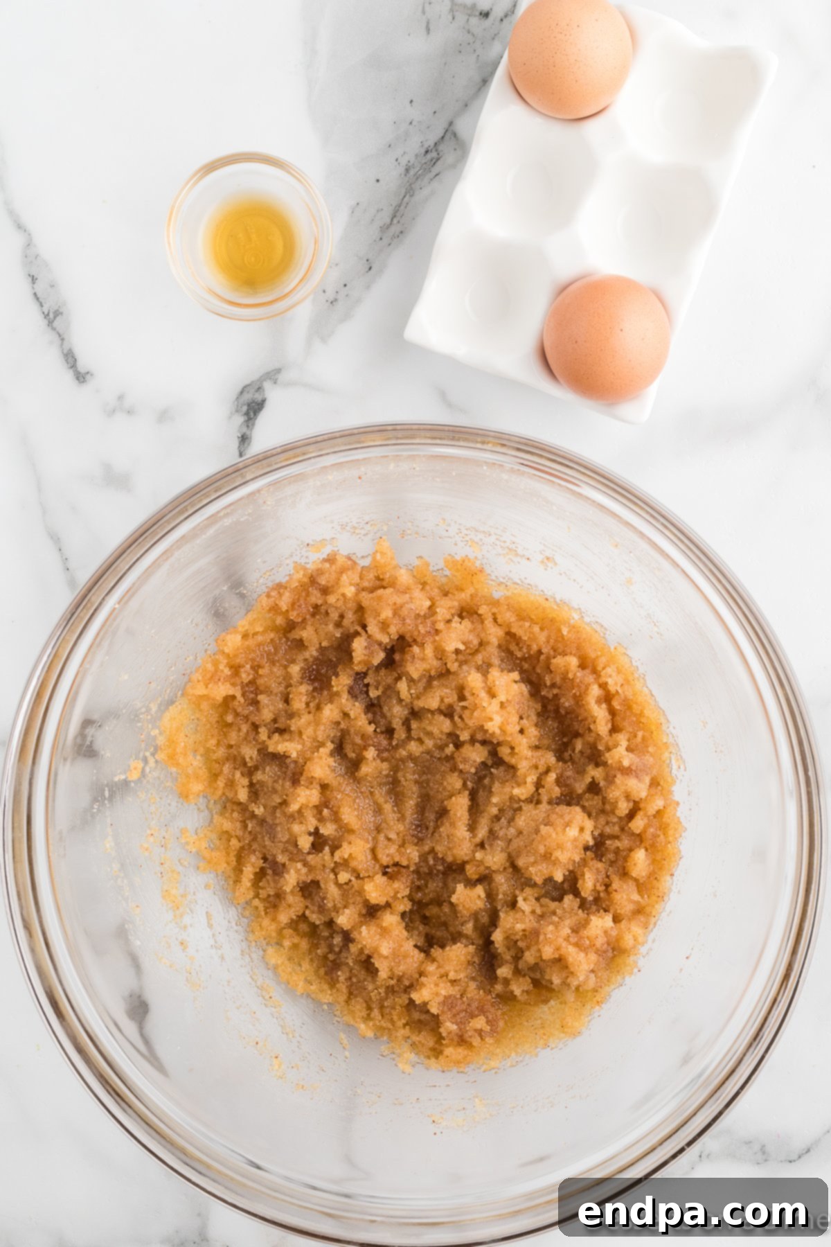 Ultimate Nutella Bomb Cookies 6 Eggs and sugar mixed into butter.