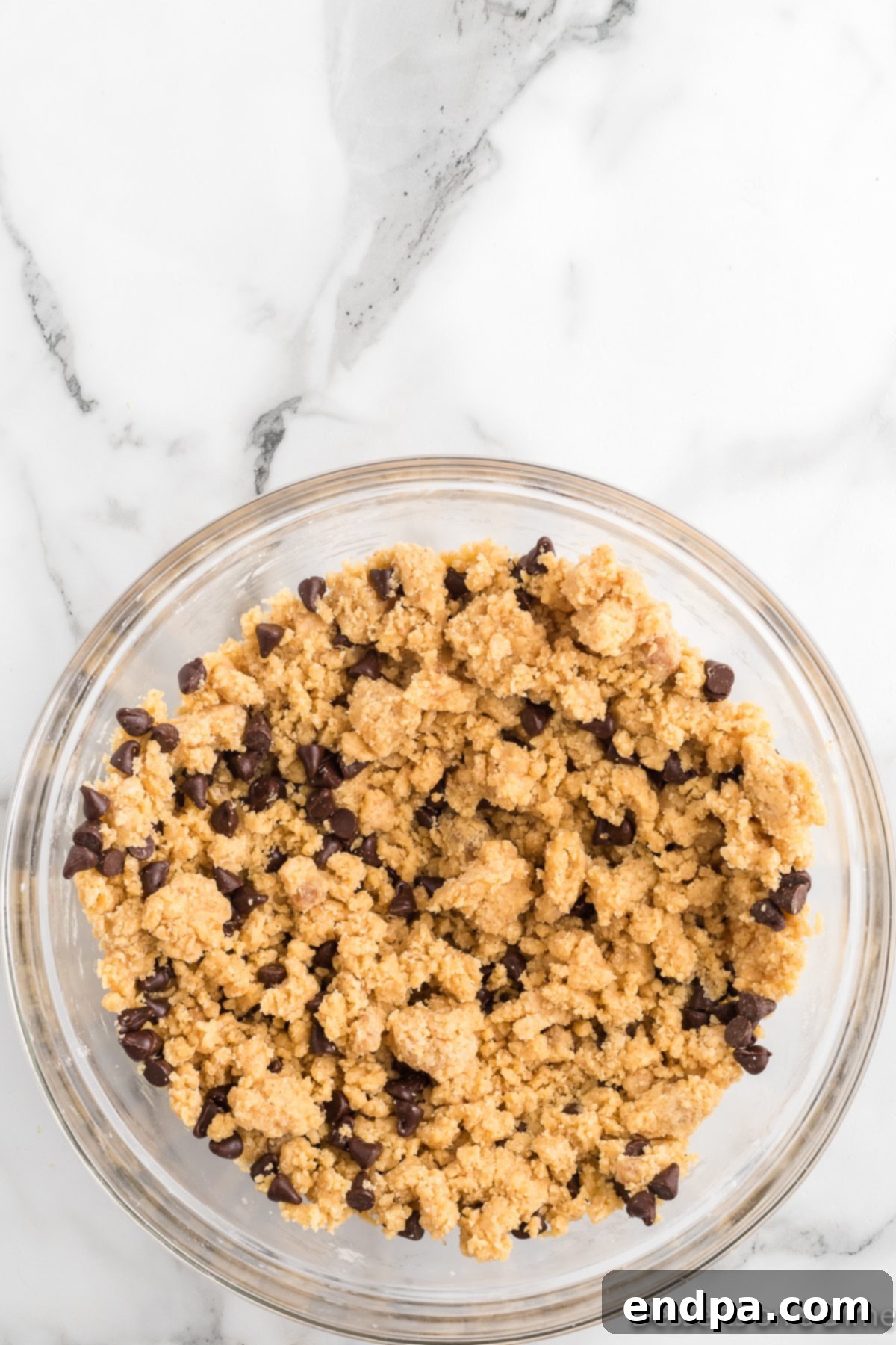 Ultimate Nutella Bomb Cookies 10 Chocolate Chips folded into batter.