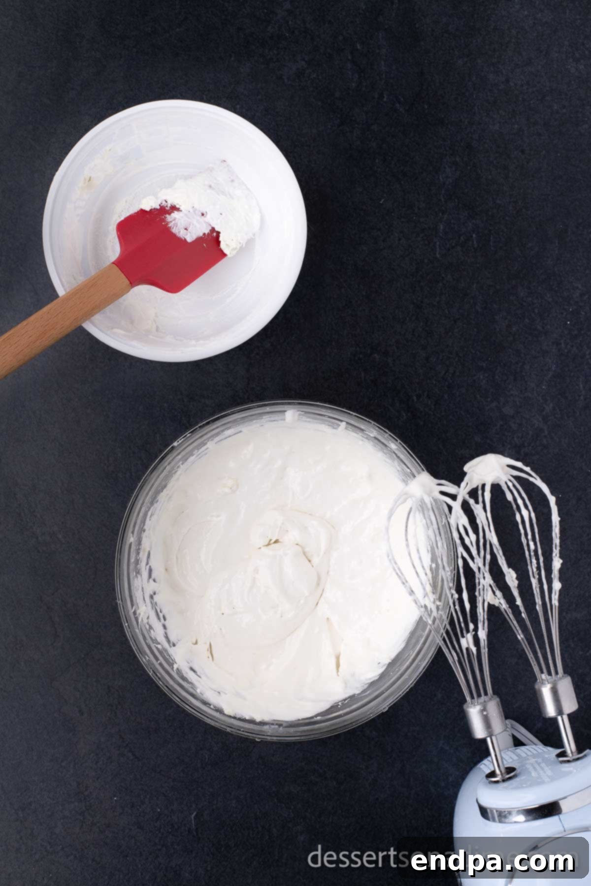 Heavenly Cherry Cheesecake Tacos 7 Cheesecake filling ingredients being smoothly combined in a mixing bowl.