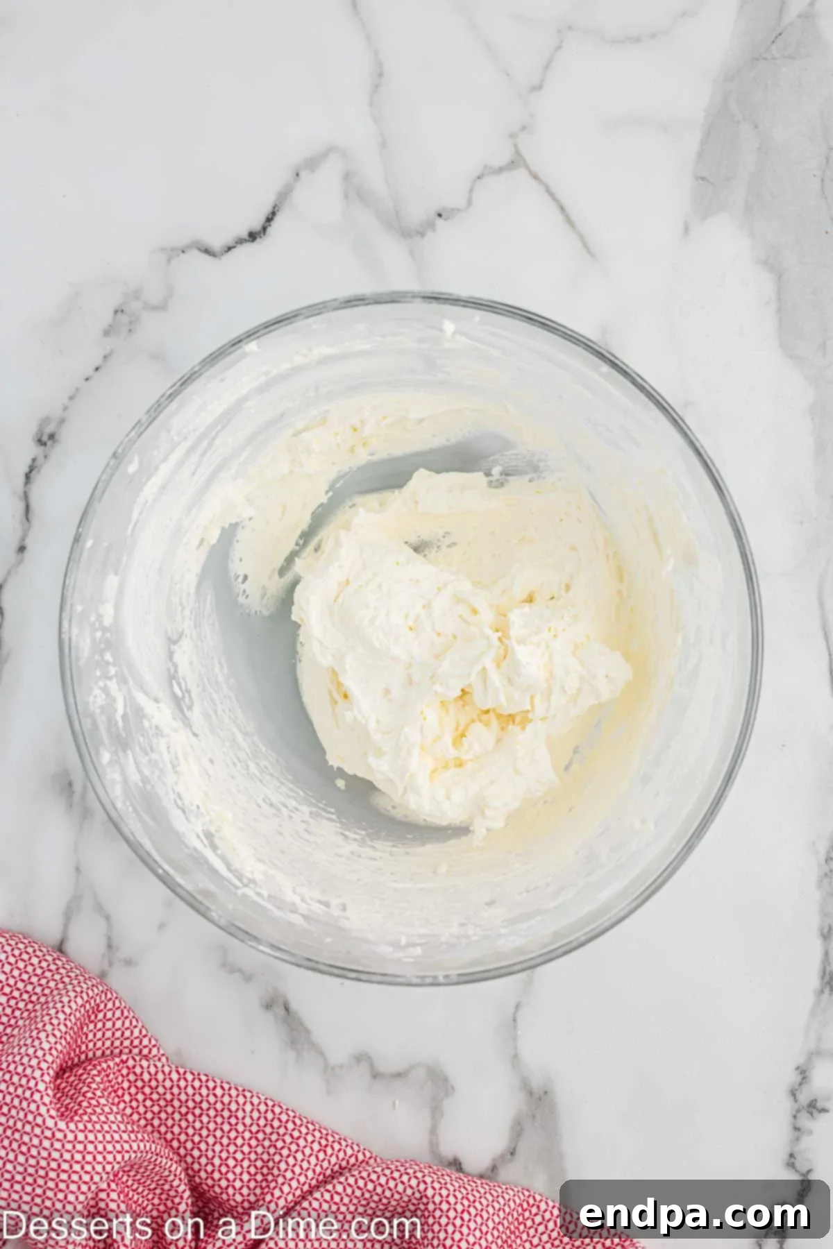 Butter and powdered sugar in mixing bowl. 