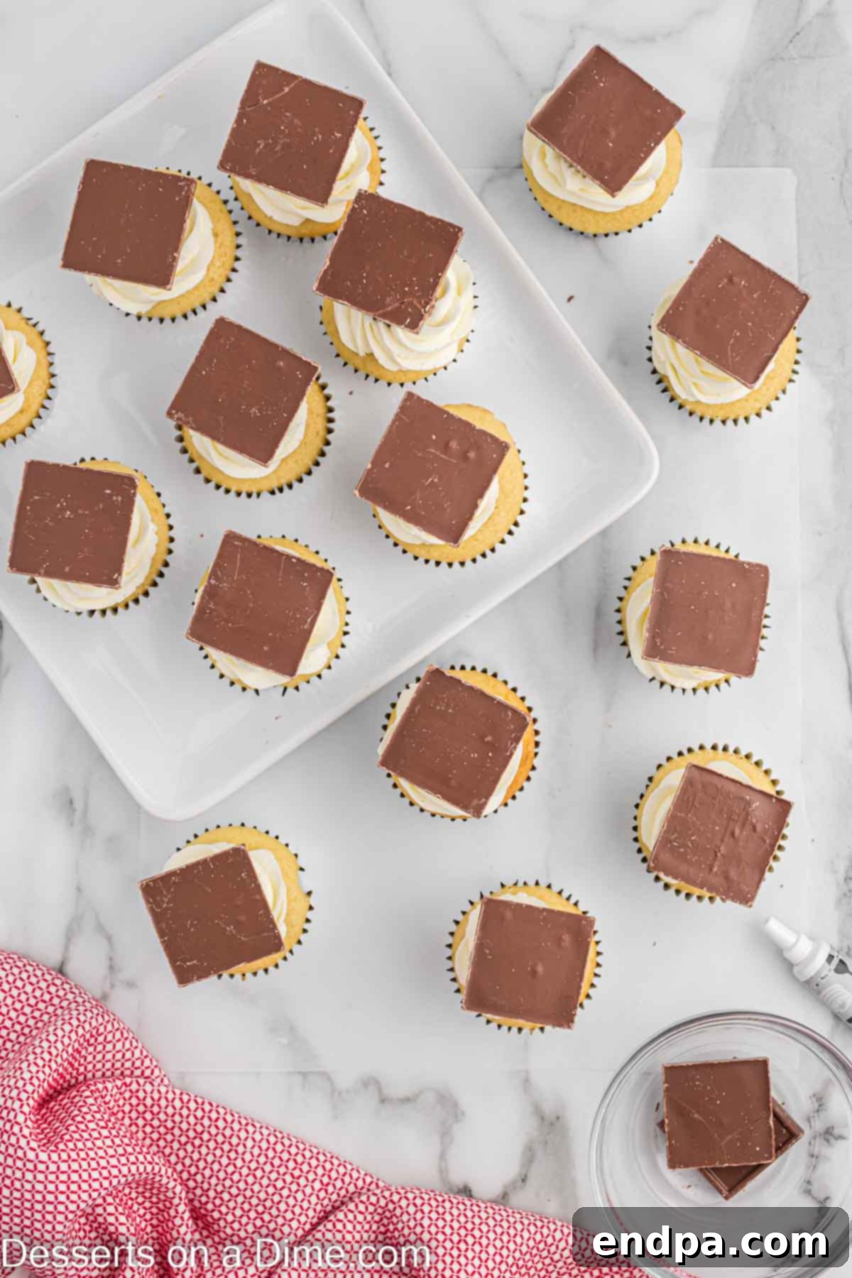 Chocolate square on each cupcake. 