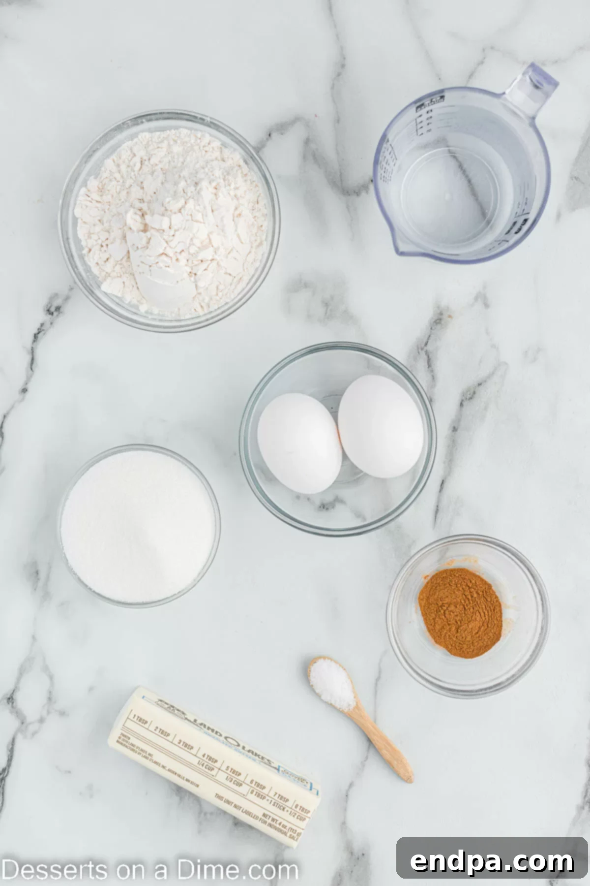 Ingredients for Air fryer churros including butter, flour, ground cinnamon, eggs, and sugar.