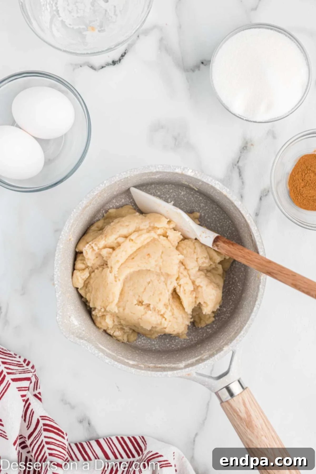 Flour mixture mixed into the pan, forming a dough ball.