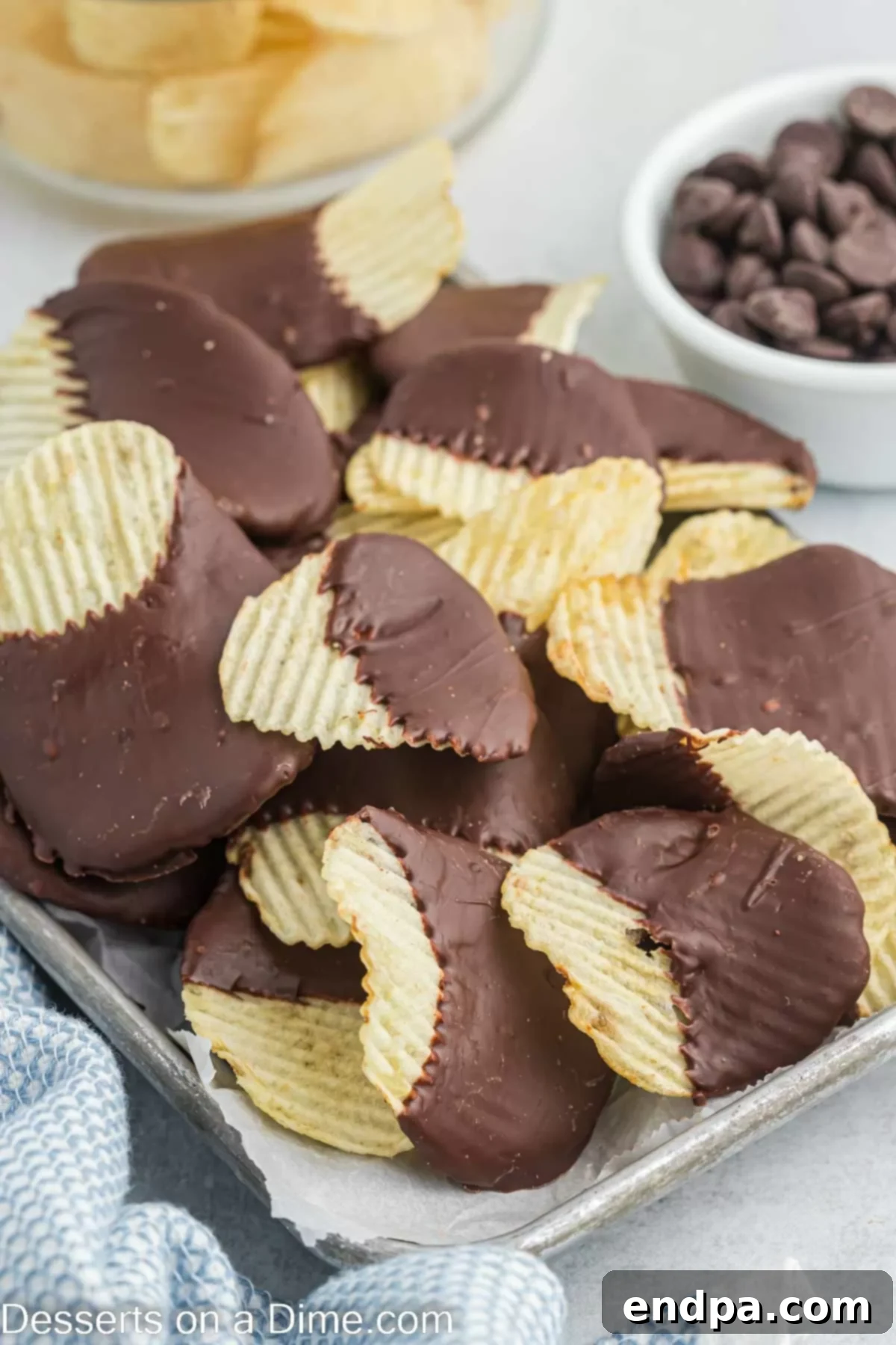 A delightful tray of freshly made Chocolate Dipped Potato Chips, showcasing their sweet and salty allure.