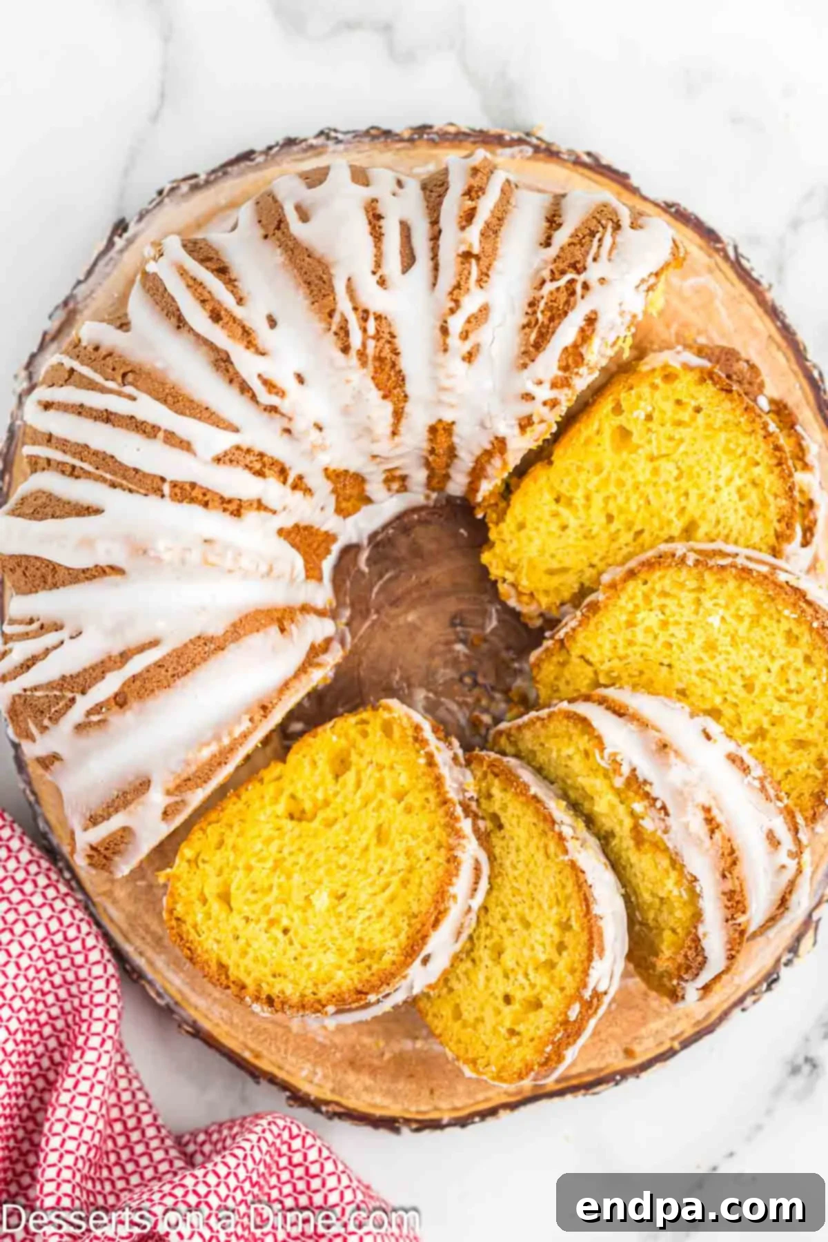 Classic 7 Up Pound Cake 10 A beautifully glazed 7 Up cake, freshly sliced and ready to be served, showcasing its moist interior.