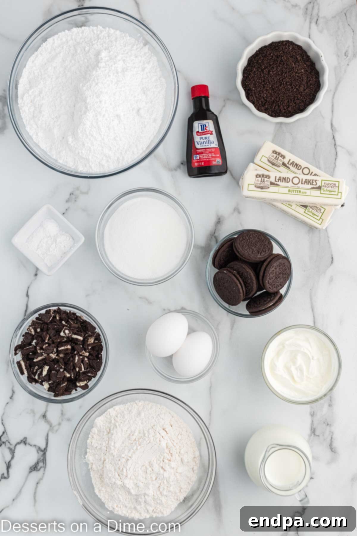 Cookies and Cream Cupcake Heaven 3 Ingredients for Oreo cupcakes including sugar, flour, butter, egg whites, sour cream, Oreo cookies, and milk.