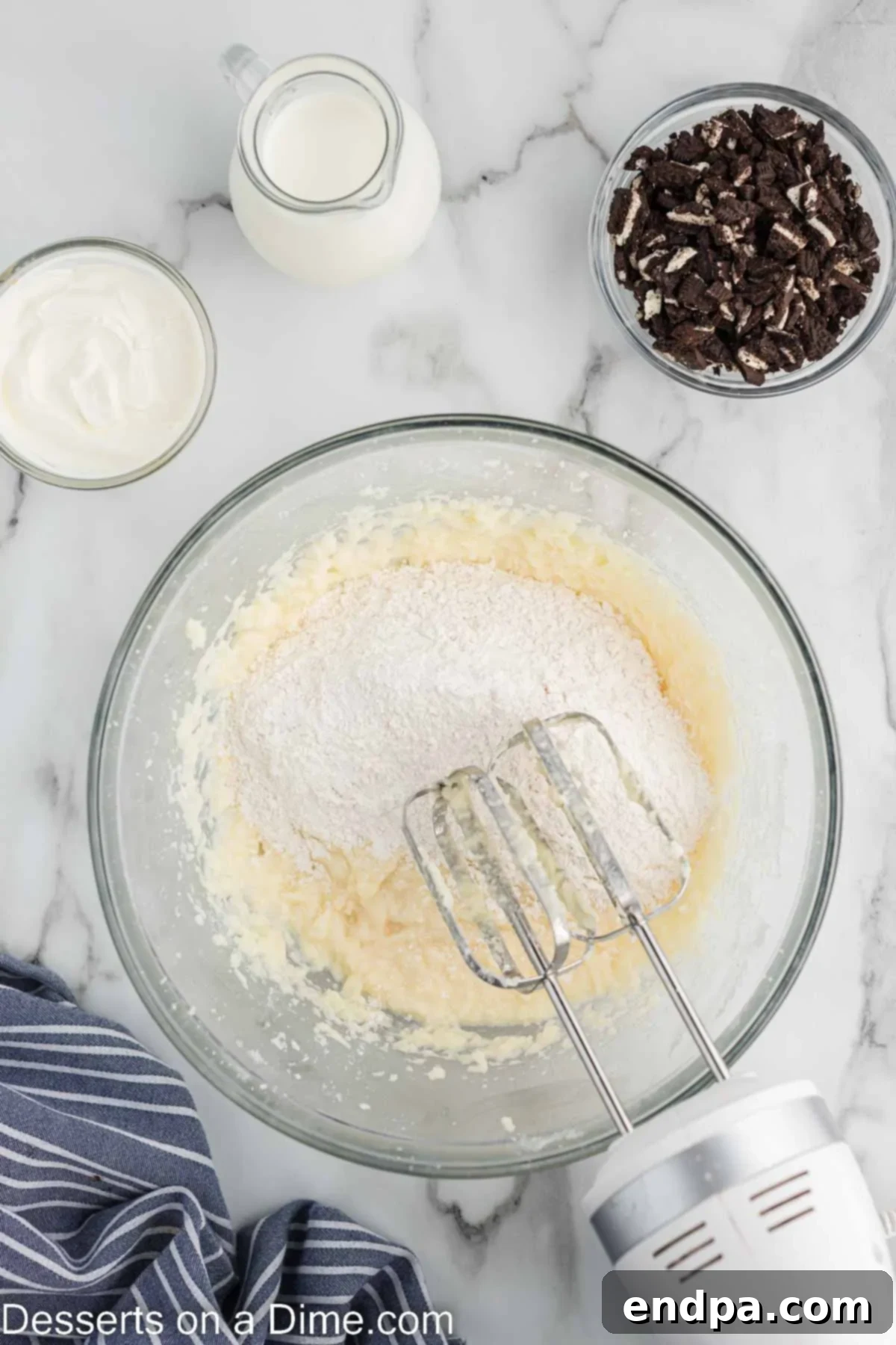 Cookies and Cream Cupcake Heaven 7 The combined wet and dry ingredients in a mixing bowl, lightly mixed.