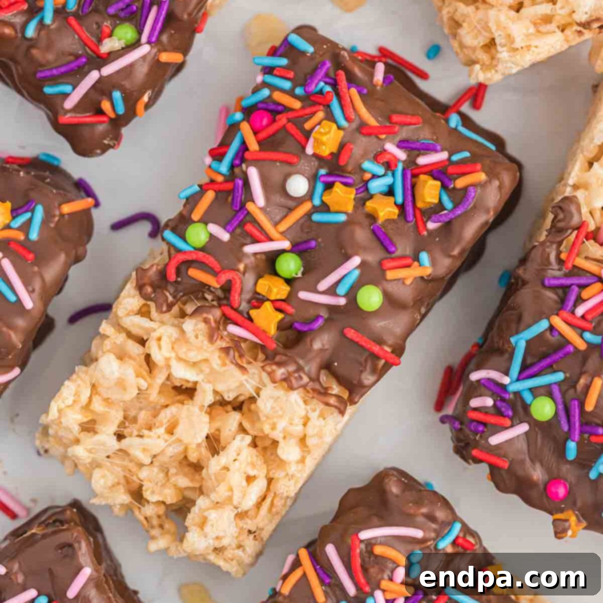 Beautifully arranged Chocolate Dipped Rice Krispie Treats, ready to be enjoyed.