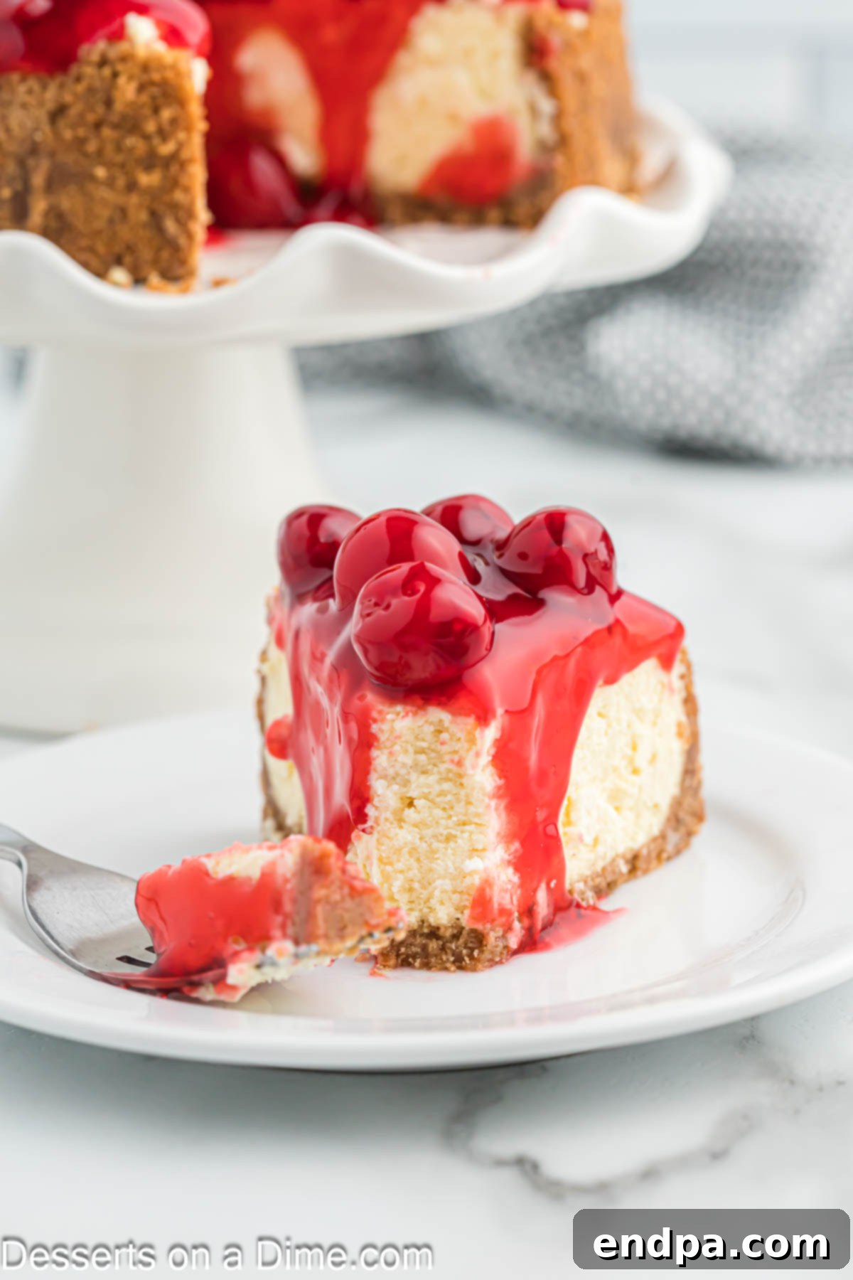 Slice of air fryer cheesecake on plate ready to serve.