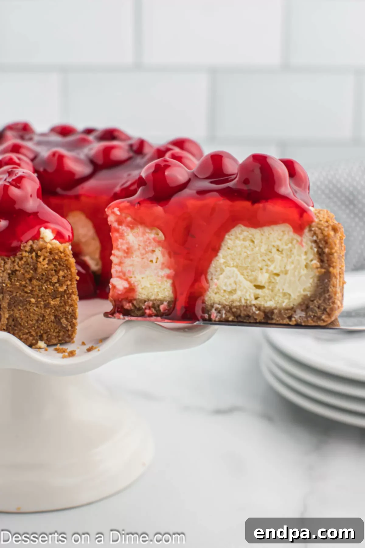 Air fryer cheesecake on a pedestal.