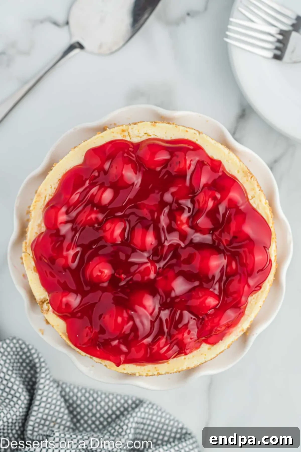 Cherry pie filling on top of cheesecake.
